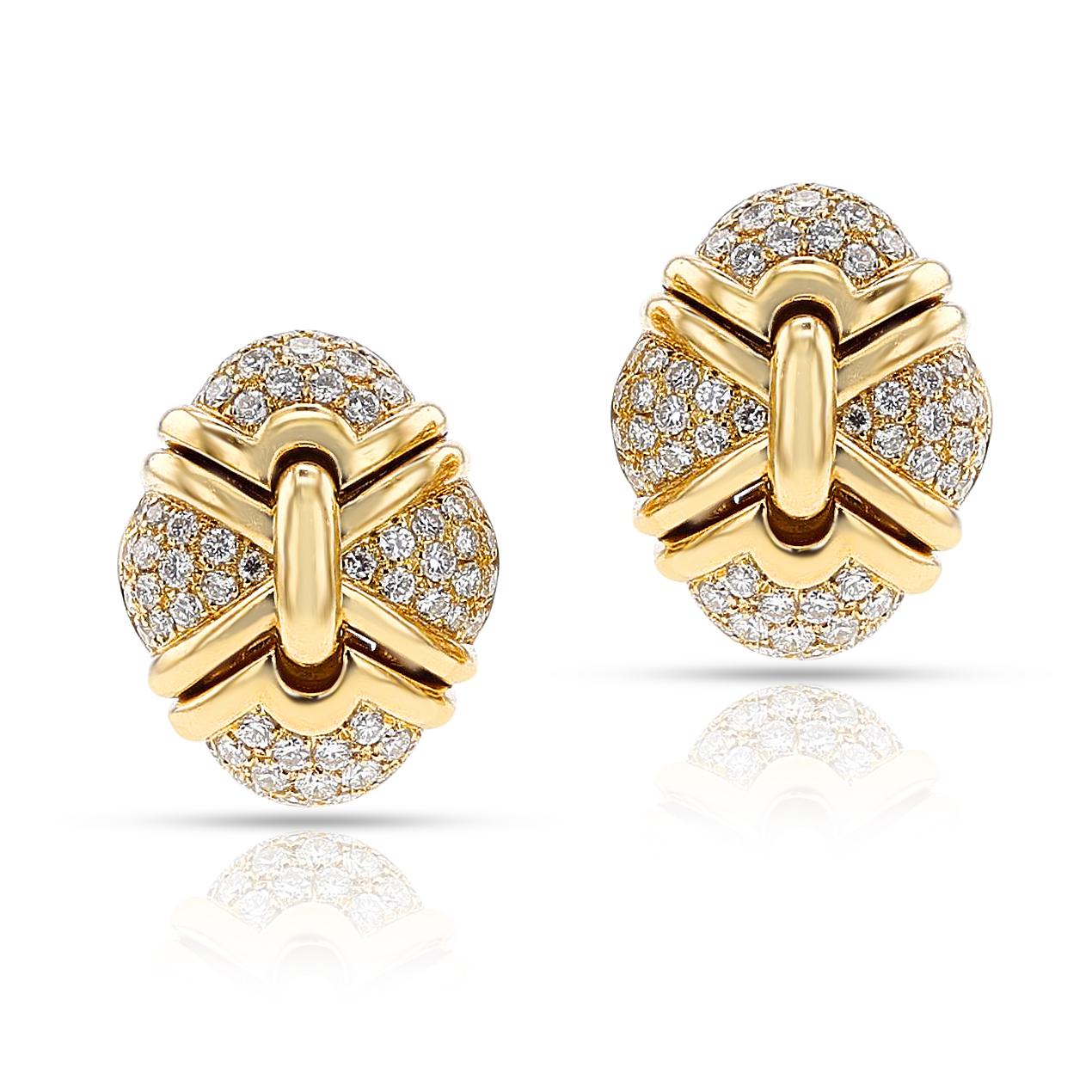 A pair of BVLGARI Diamond and 18k Gold Earrings. The total weight of the diamonds is 3.50 carats, G-H color, VS clarity, The total weight is 42.30 grams. The dimensions are 1 inch by 0.81 inch. Stamped, serial number.