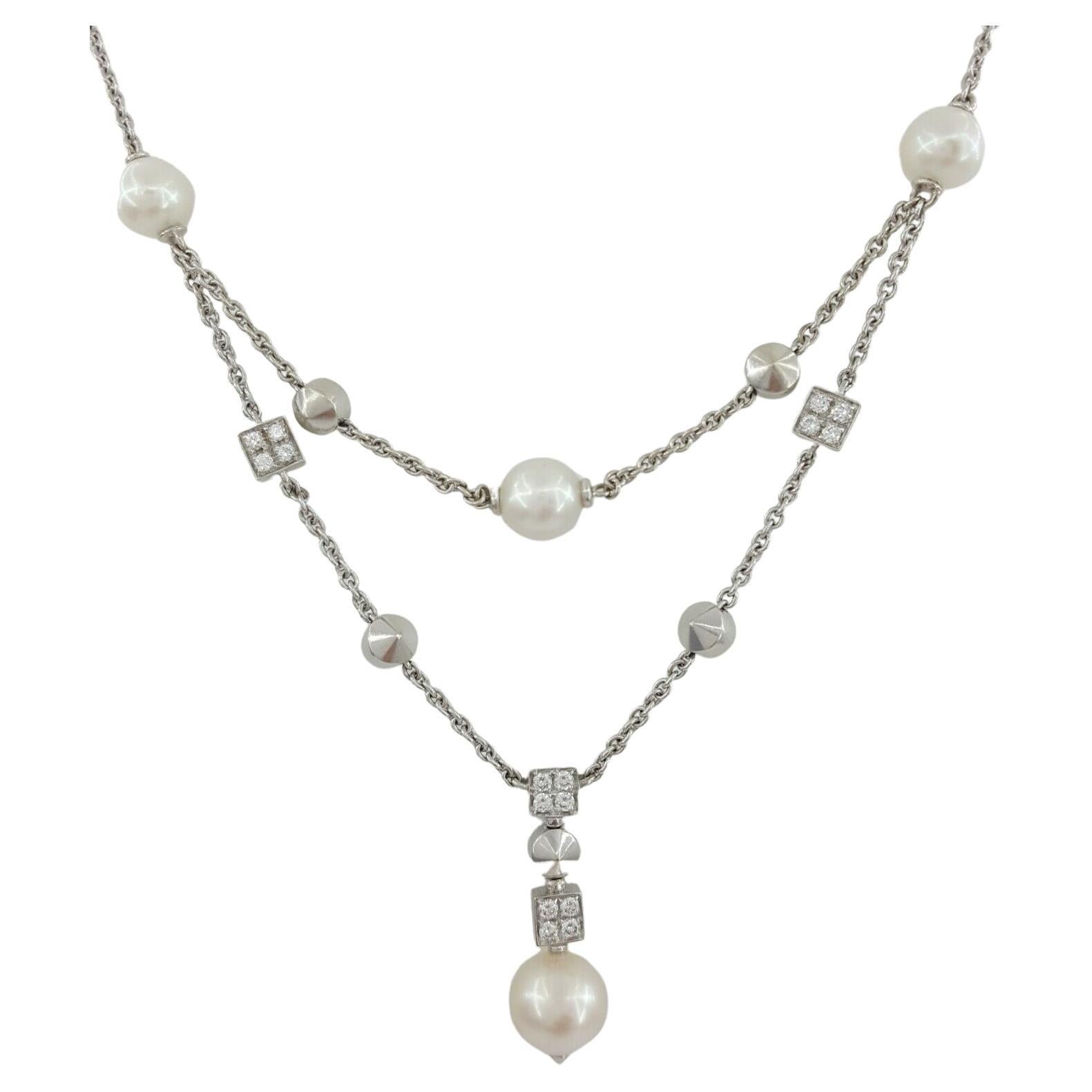 Bvlgari Lucia 18k White Gold 7-9mm Pearl & ~0.60 ct Round Diamonds Dangling Necklace.


The necklace and also contains 40 Round Brilliant cut Diamonds weighing approximately 0.60 ct total weight, F-G in color, VS1-VS2 in Clarity, measuring