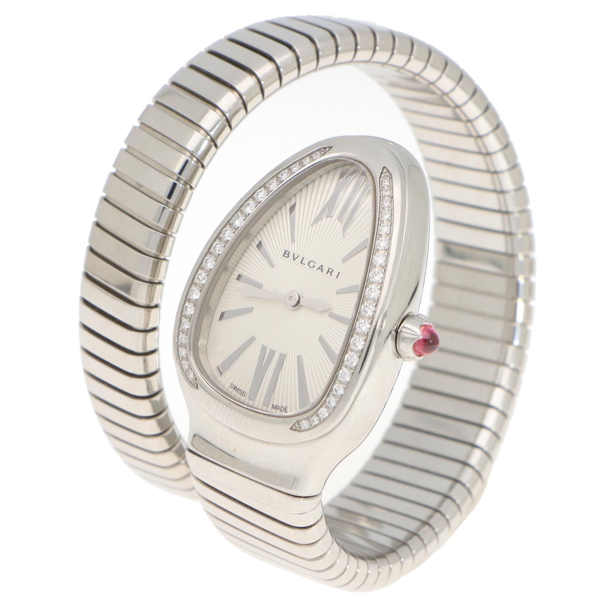 A beautiful Bvlgari Serpenti Tubogas Snake watch in stainless steel. 

Serpenti Tubogas watch with quartz movement, 35 mm stainless steel curved case set with brilliant cut diamonds, stainless steel crown set with a cabochon cut pink rubelite,