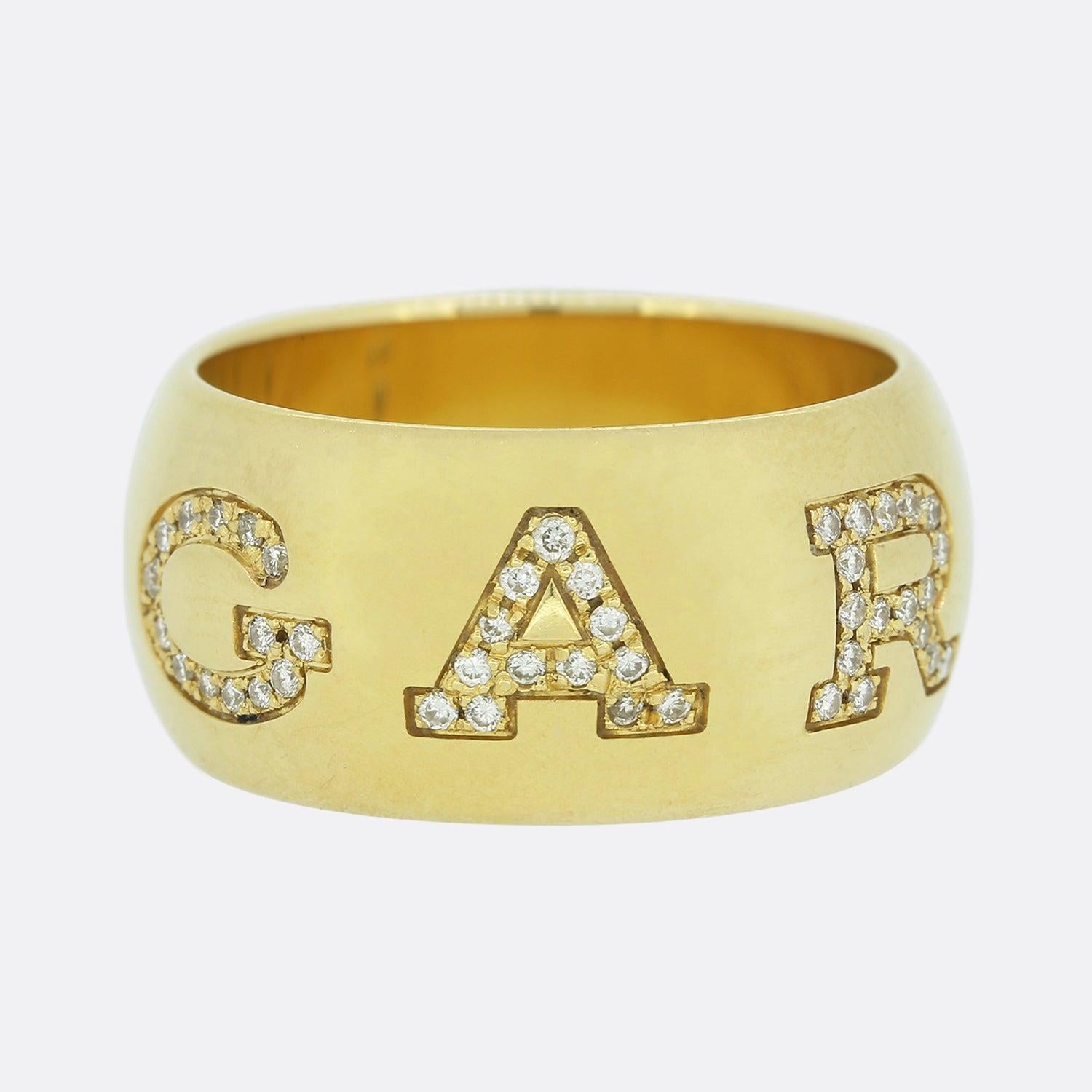 Here we have a stunning diamond ring from the world renowned Italian jewellery house of Bvlagri. This piece has been crafted from 18ct yellow gold and showcases an inlaid logo featuring round brilliant cut diamonds.

Condition: Used (Very