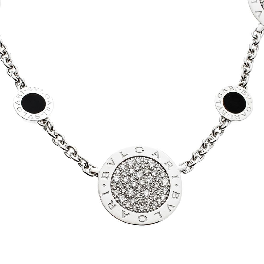 Crafted from an 18k white gold body, this Bvlgari necklace is a simply elegant accessory to grace your looks. It comes with detailed with diamond embedded motifs and secured with a lobster clasp closure that can be adjusted to the desired drop. Wear