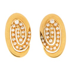 Bvlgari Clips d'oreilles tourbillon en or jaune 18 carats sertis de diamants