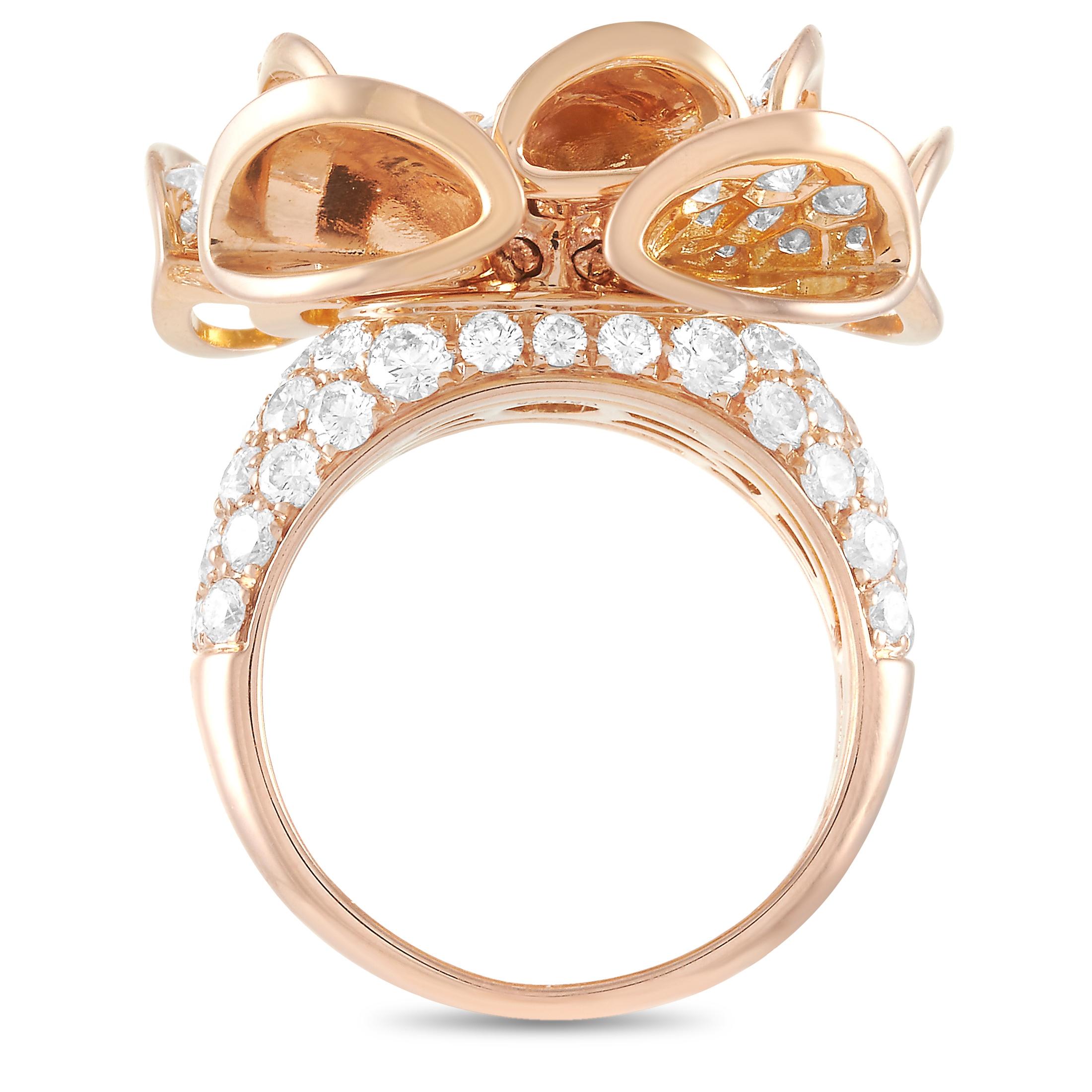 The Bvlgari “Divas' Dream” ring is crafted from 18K rose gold and weighs 13.7 grams. It boasts band thickness of 4 mm and top height of 9 mm, while top dimensions measure 20 by 20 mm. The ring is set with diamonds that feature F color and VVS
