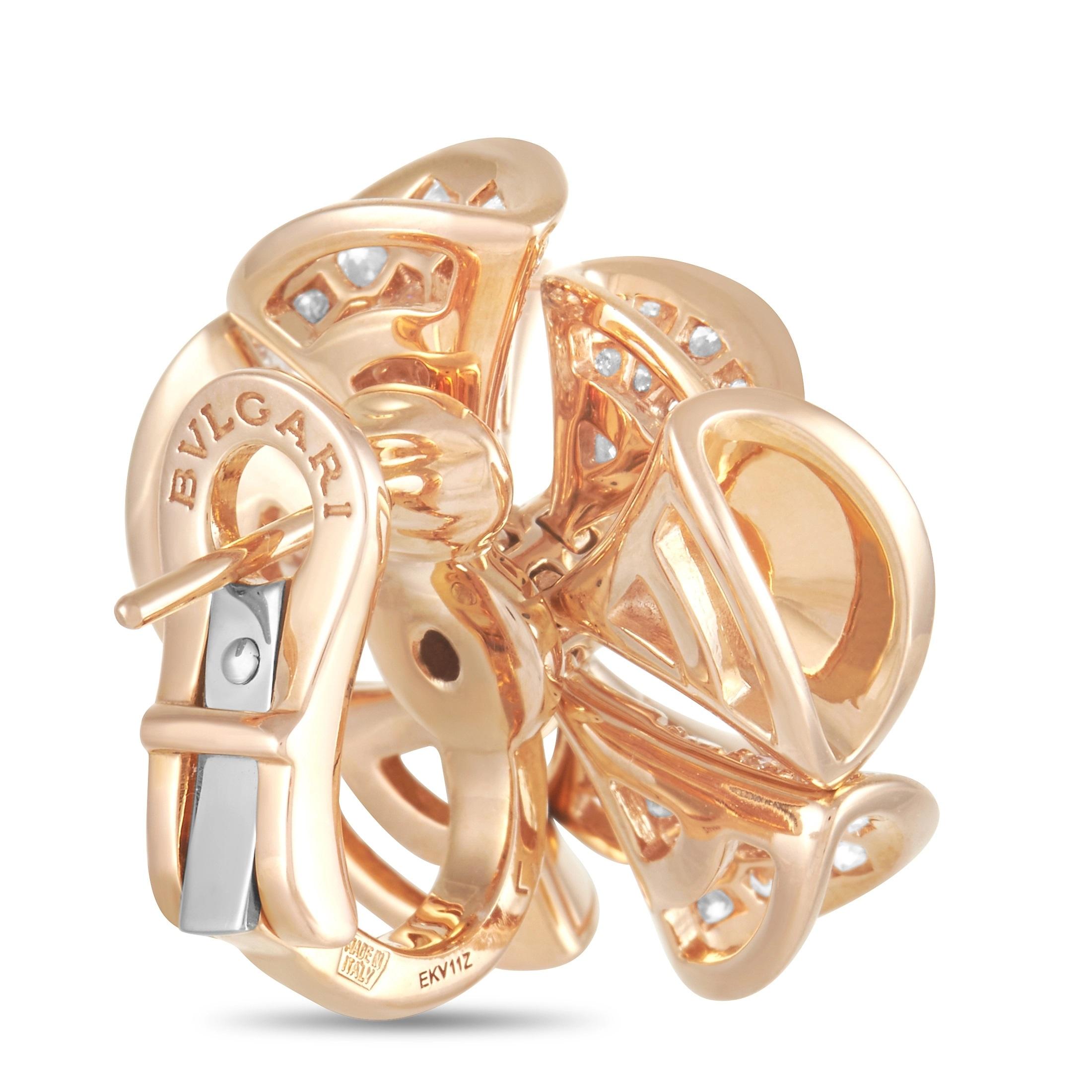 A contemporary floral motif comprised of triangular components make these luxurious Bvlgari Divas Dream earrings unlike anything you have seen before. If the shimmering 18K Rose Gold setting doesn’t take your breath away, the creative array of