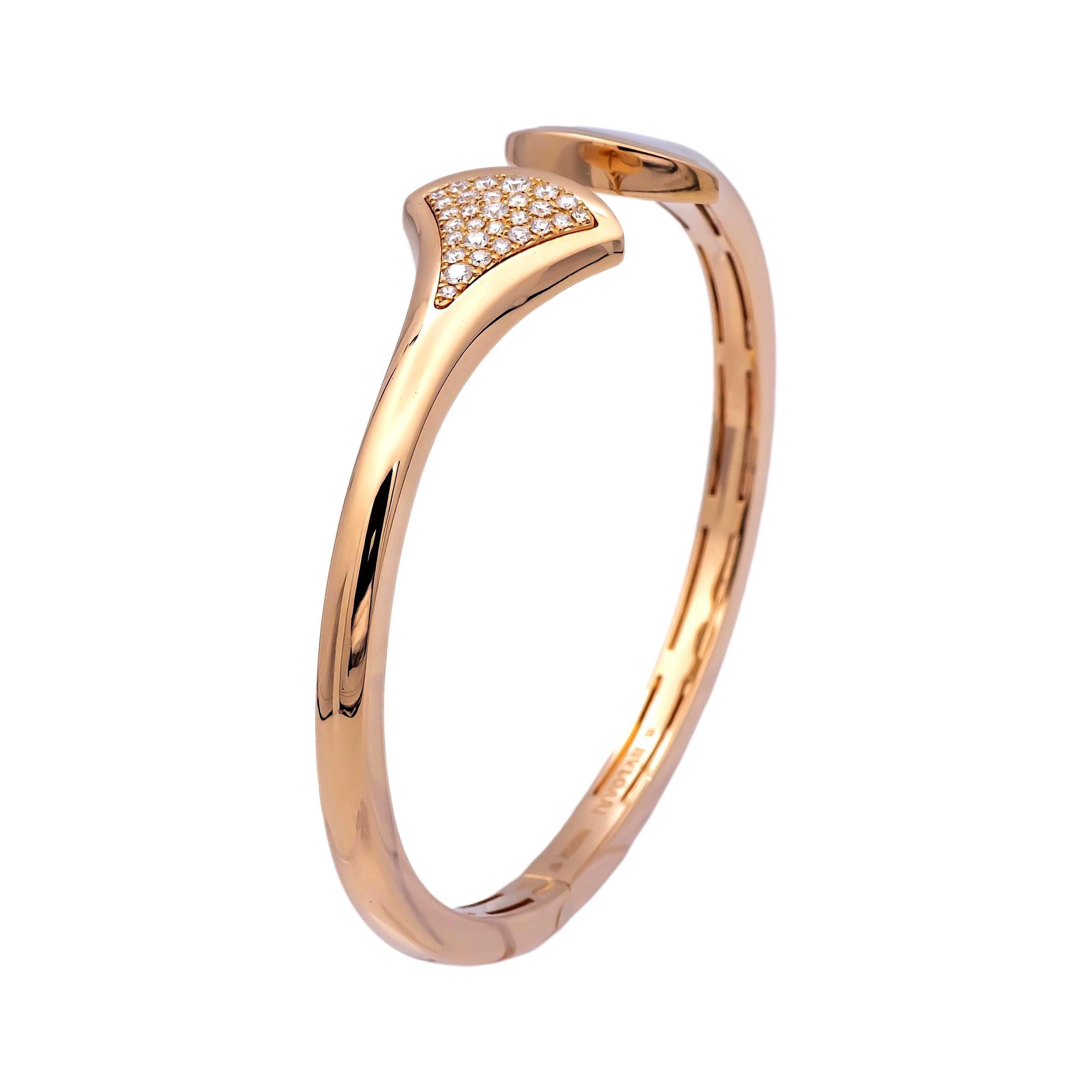 Bvlgari open cuff bracelet from the Diva's dream collection finely crafted in 18K rose gold featuring one section of mother of pearl inlay and another section of 29 micro pave set round brilliant cut diamonds weighing 0.16 carats total weight