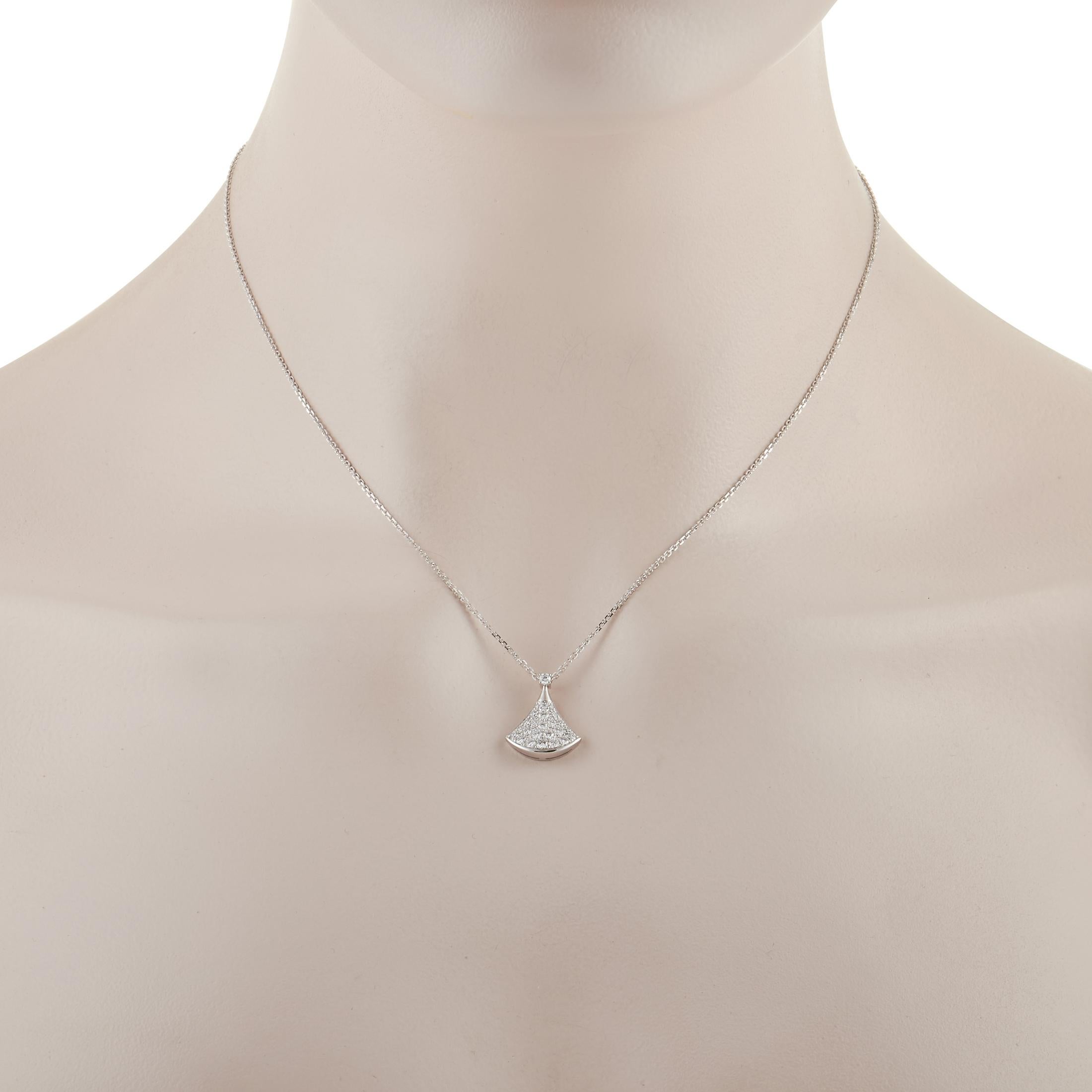 This Divas Dream pendant necklace from Bvlgari is a stunning piece that is simple, elegant, and scintillating. Attached to a 16.5” chain, you’ll find a striking 18K White Gold pendant measuring .63” wide and .5” long that shines to life thanks to an
