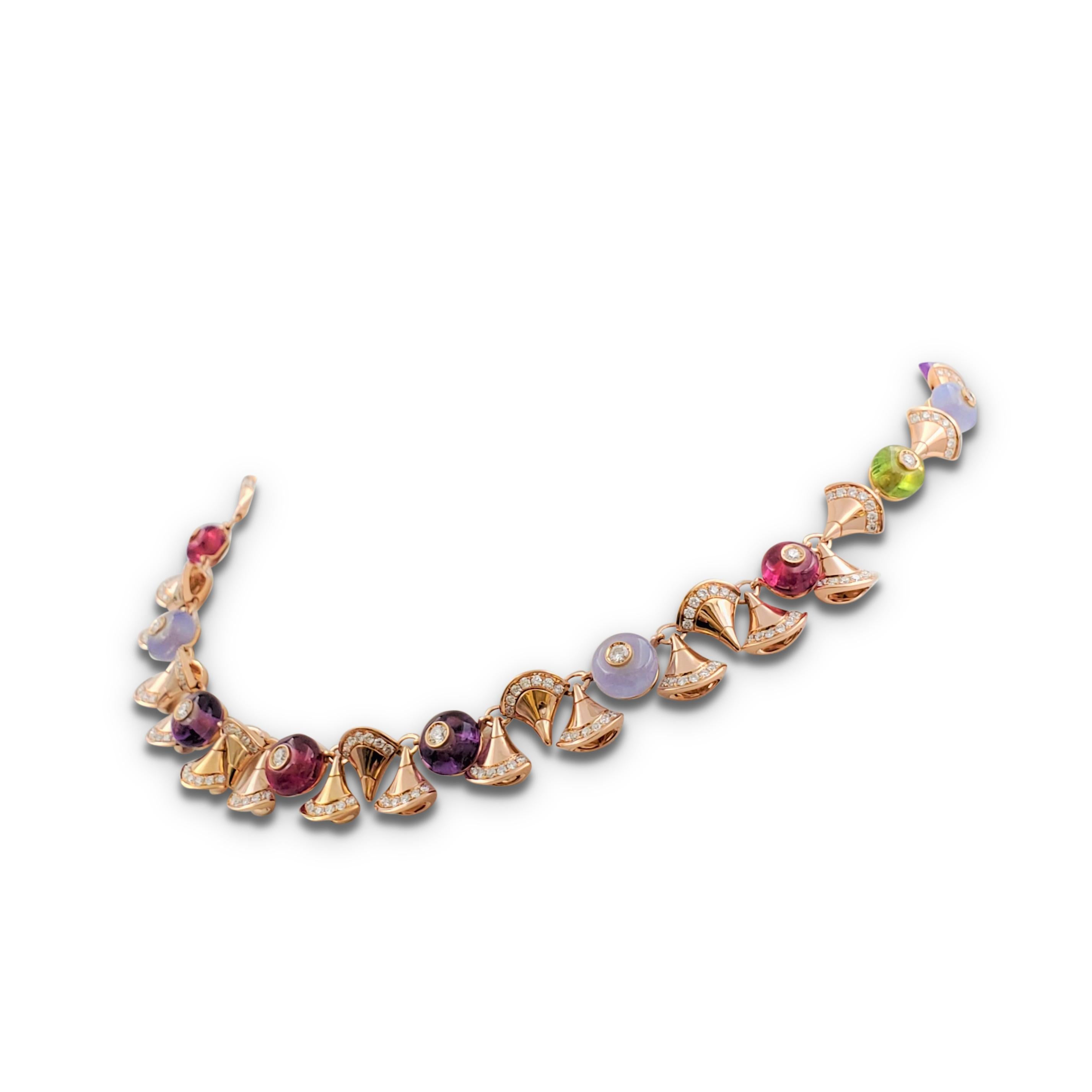 Authentic magnificent Bvlgari necklace from the 'Diva's Dream' collection center on dancing fan-shaped elements crafted in 18 karat rose gold pave set with an estimated 2.48 carats of round brilliant cut diamonds (E-F, VS). The necklace is adorned