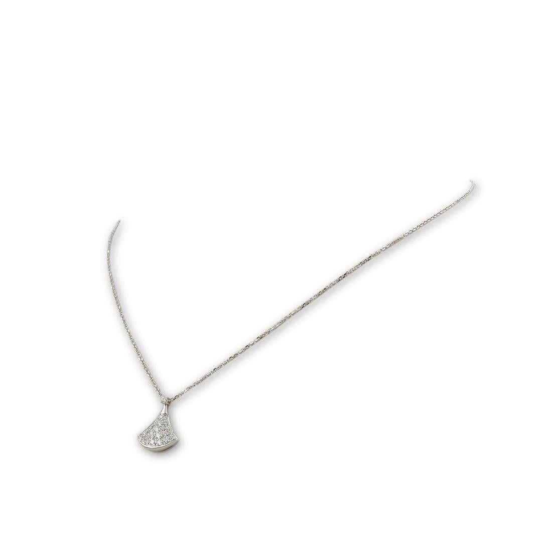 Authentic Bvlgari necklace crafted in 18 karat white gold featuring a fan-shaped diamond pendant, set with round brilliant diamonds weighing approximately 0.47 carats. The chain measures 17 inches in total length and is worn at an 8 inch drop. The
