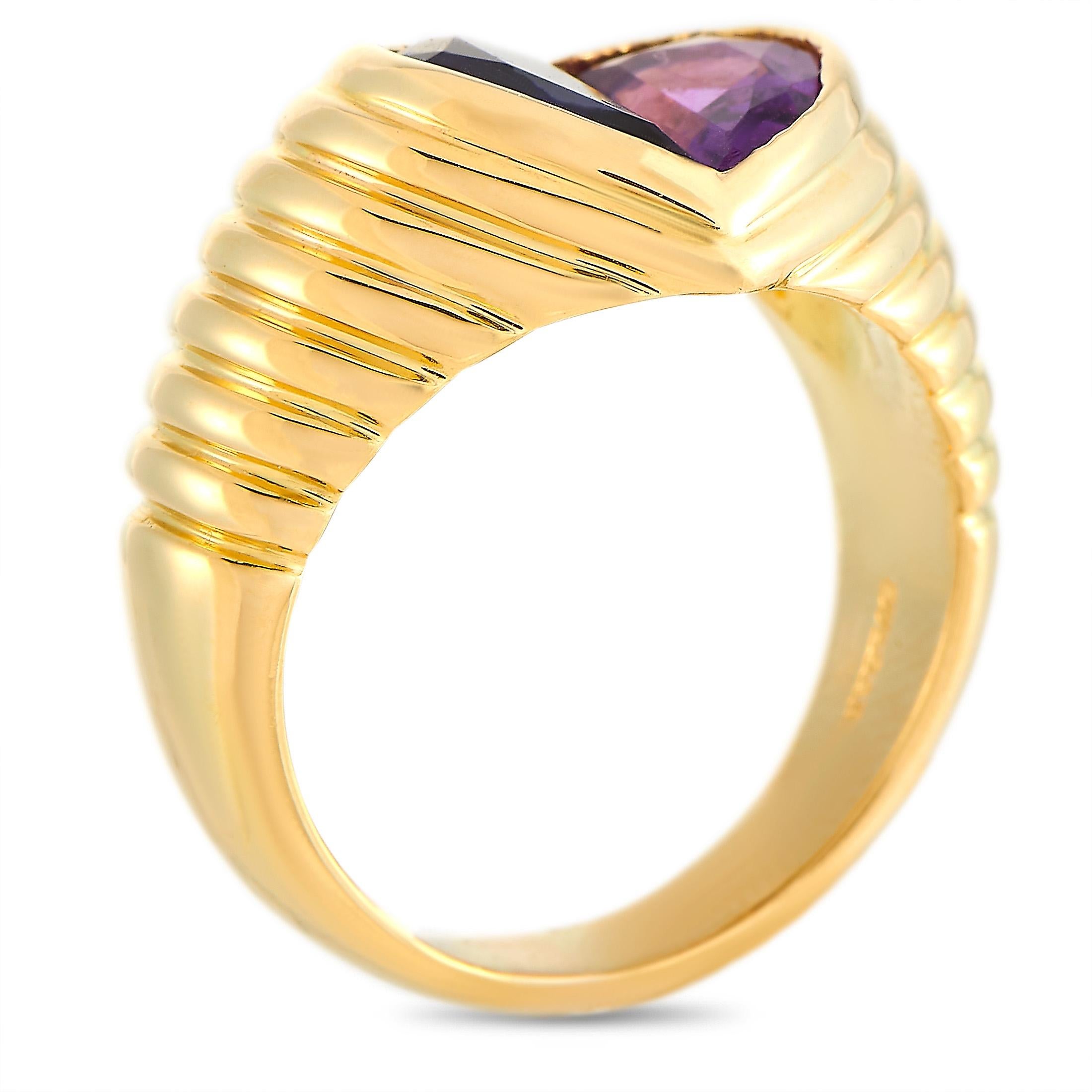 The Bvlgari “Doppio” ring is made of 18K yellow gold and set with an amethyst and an iolite. The ring weighs 10.9 grams, boasting band thickness of 5 mm and top height of 3 mm, while top dimensions measure 10 by 10 mm.
 
 This item is offered in