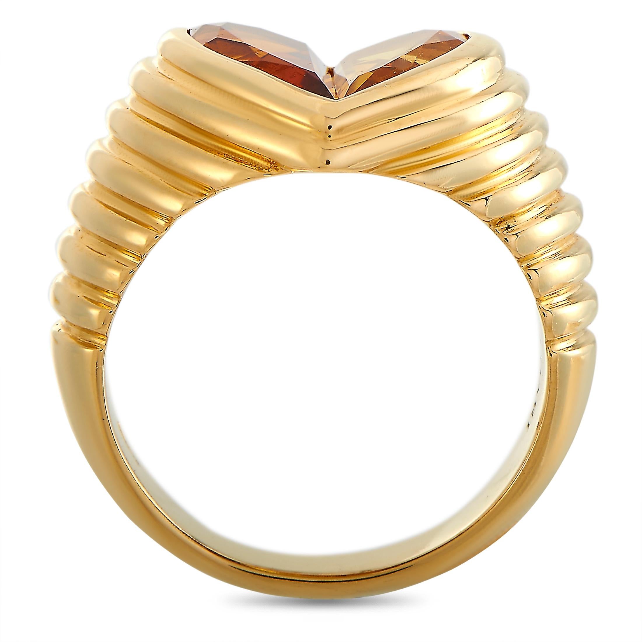 The Bvlgari “Doppio” ring is made out of 18K yellow gold and citrine and weighs 9.1 grams. The ring boasts band thickness of 4 mm and top height of 5 mm, while top dimensions measure 12 by 11 mm.
 
 This jewelry piece is offered in estate condition