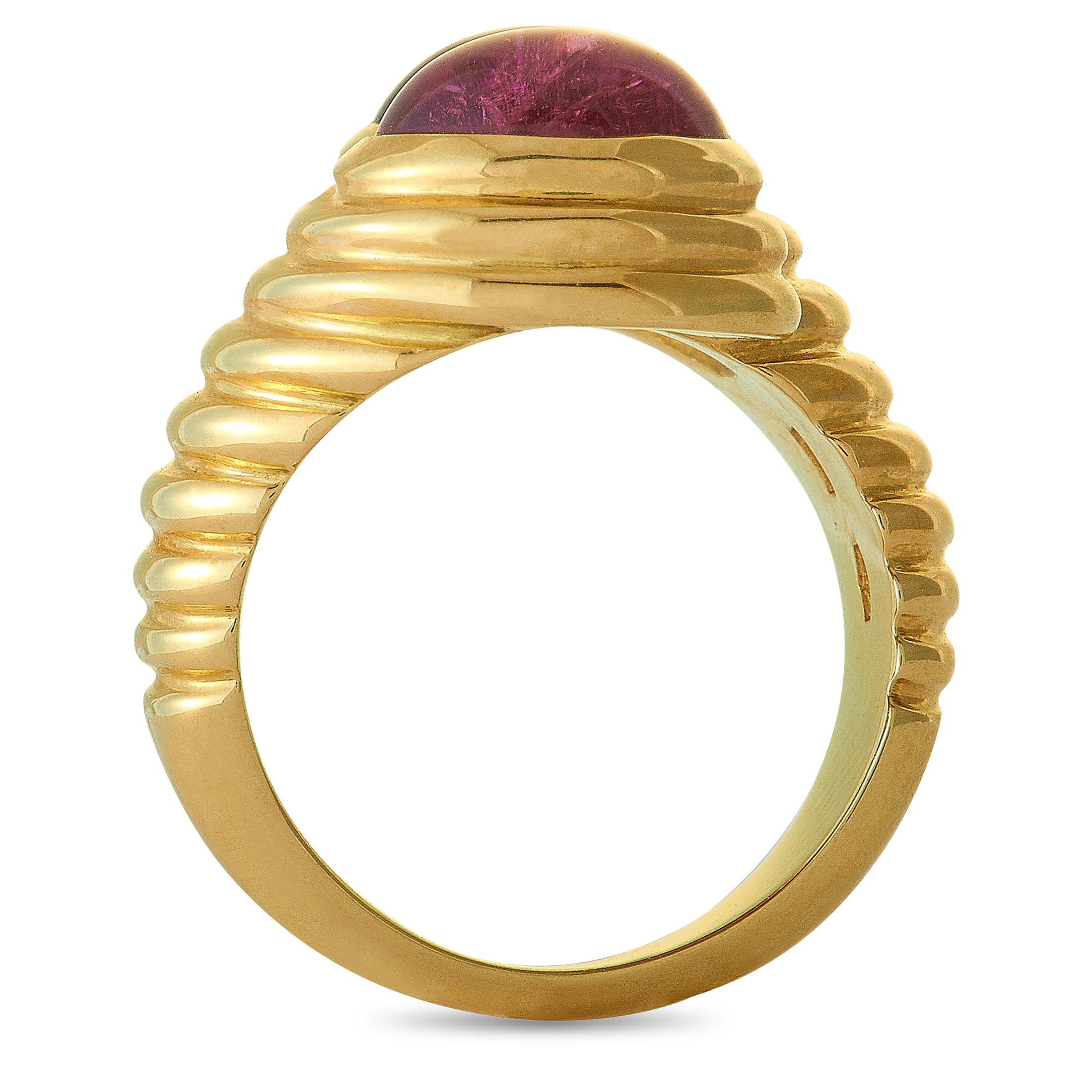 The Bvlgari “Doppio” ring is crafted from 18K yellow gold and set with an amethyst and a tourmaline. The ring weighs 12.8 grams, boasting band thickness of 3 mm and top height of 7 mm, while top dimensions measure 10 by 17 mm.

This item is offered