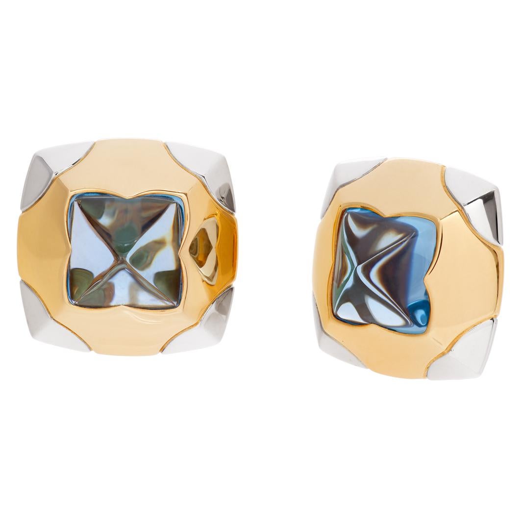 ESTIMATED RETAIL: $6,600 YOUR PRICE: $4,620 - Glamorous Bvlgari earrings in 18k yellow and white gold with blue topaz. With Box. Hanging length 0.99 inches (25.2mm), width 1 inches (25.4mm).