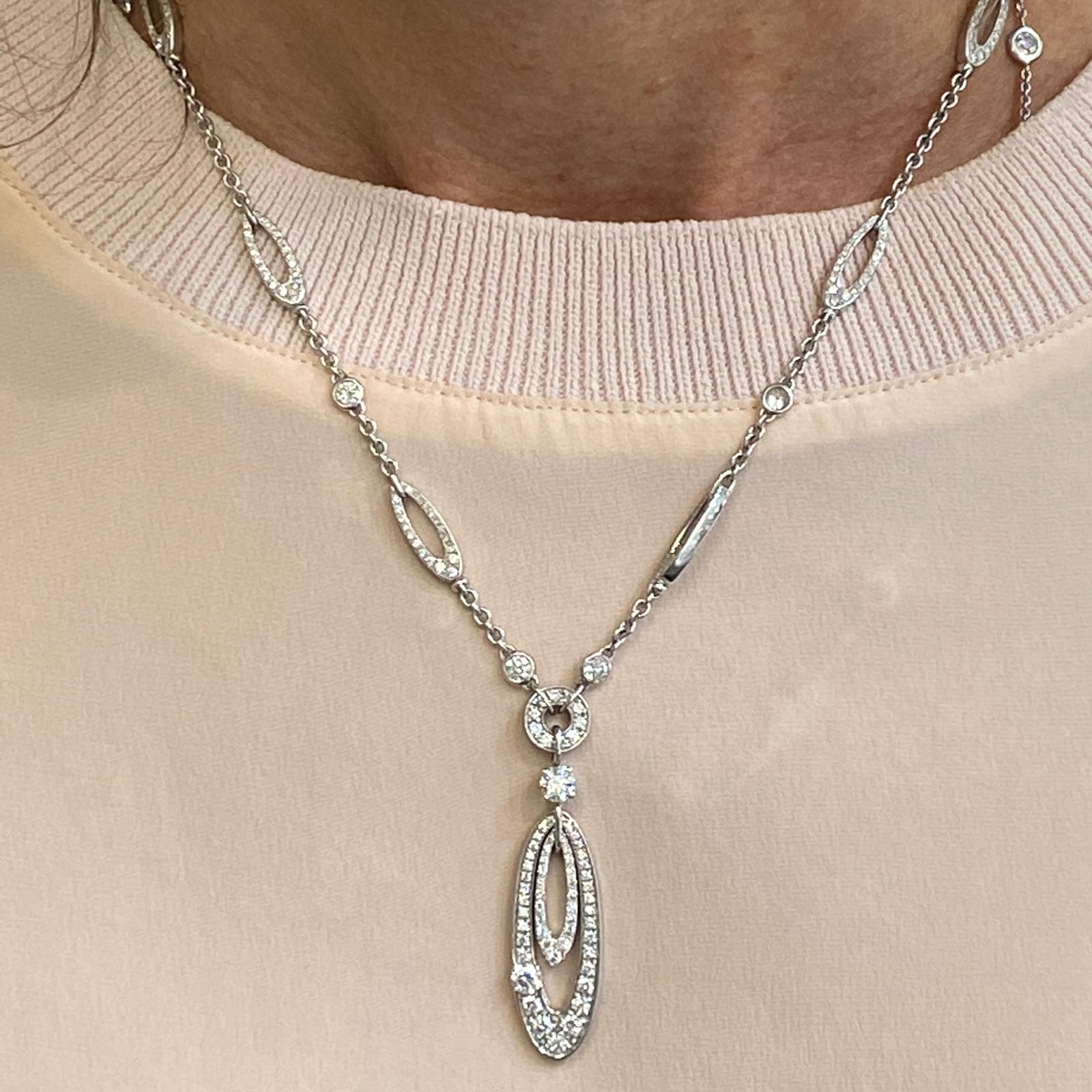 The Bvlgari “Elisia” necklace is crafted from 18K white gold and diamonds. The diamonds are graded F color and VS clarity and amount to approximately 4.00 carats total weight.  The chain is 17.00” long and features a lobster claw closure.