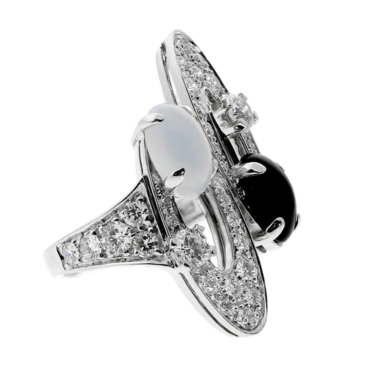 A unique Elisia diamond onyx gold ring from Bulgari, featuring round brilliant cut diamonds, onyx, and chalcedony set in stunning 18k white gold. This ring sparkles and shines and is sure to make an impression. The onyx and chalcedony add a chic