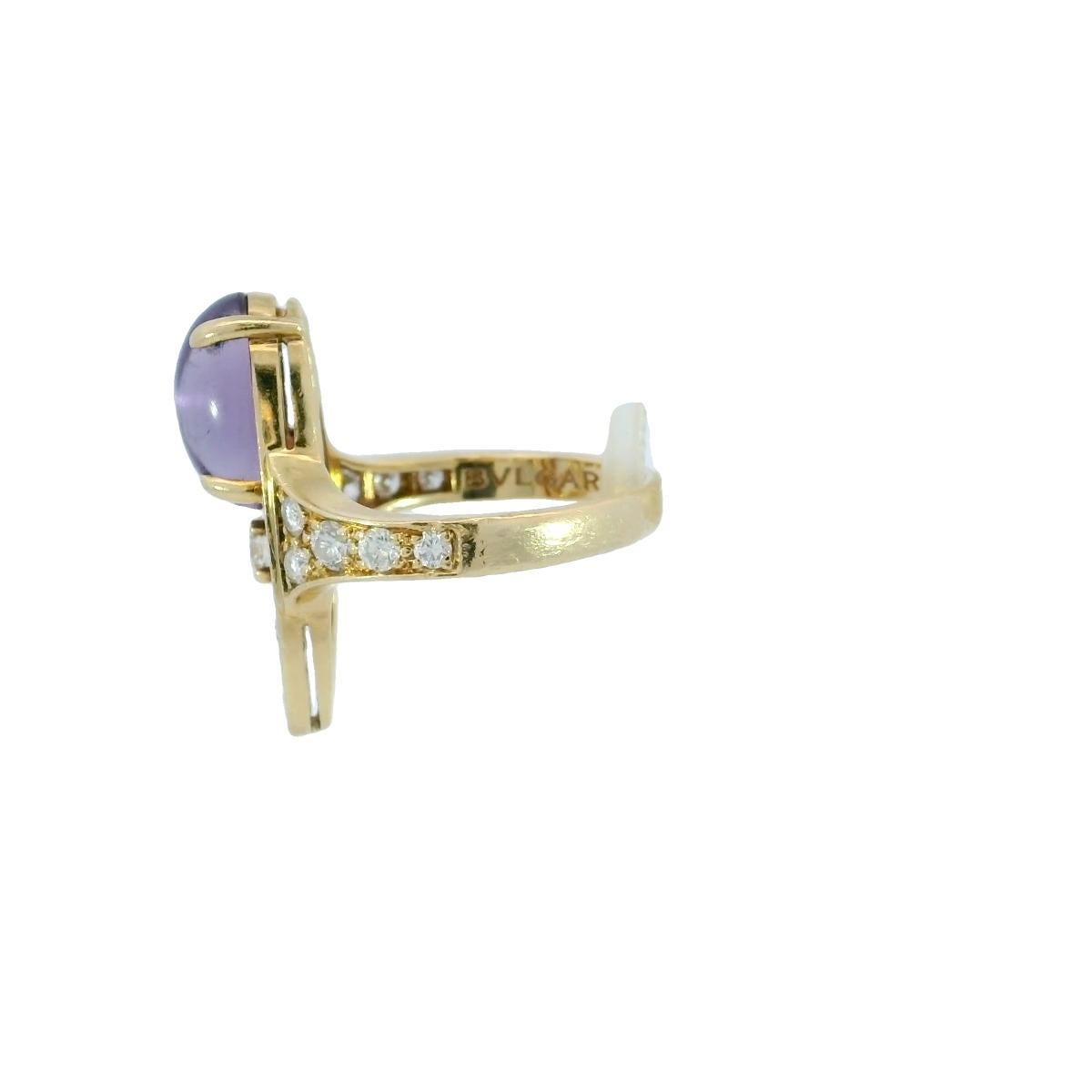Bulgari Bvlgari Diamond Elisia Ring in 18K Yellow Gold

This sculptural Bvlgari ring centers on a ~2.5-carat cabochon-cut amethyst, its rich purple tone and smooth, domed surface offering a sense of depth and quiet drama. Set in 18k yellow gold, the