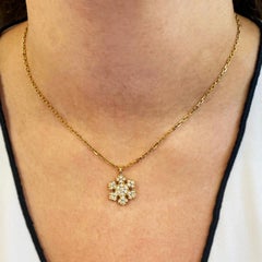 Bvlgari Fiocco di Neve Snowflake 18K Yellow Gold Diamond Charm Pendant Necklace