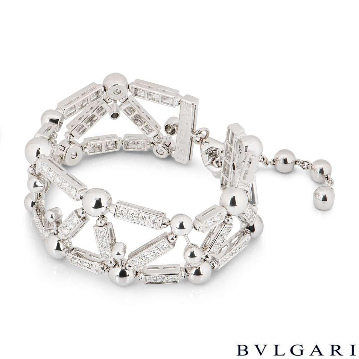 A stunning diamond set bracelet from The Fireworks collection by Bvlgari. The openwork link bracelet consists of rectangular bar links set with round brilliant cut diamonds. The links are each connected by a polished white gold ball link. The