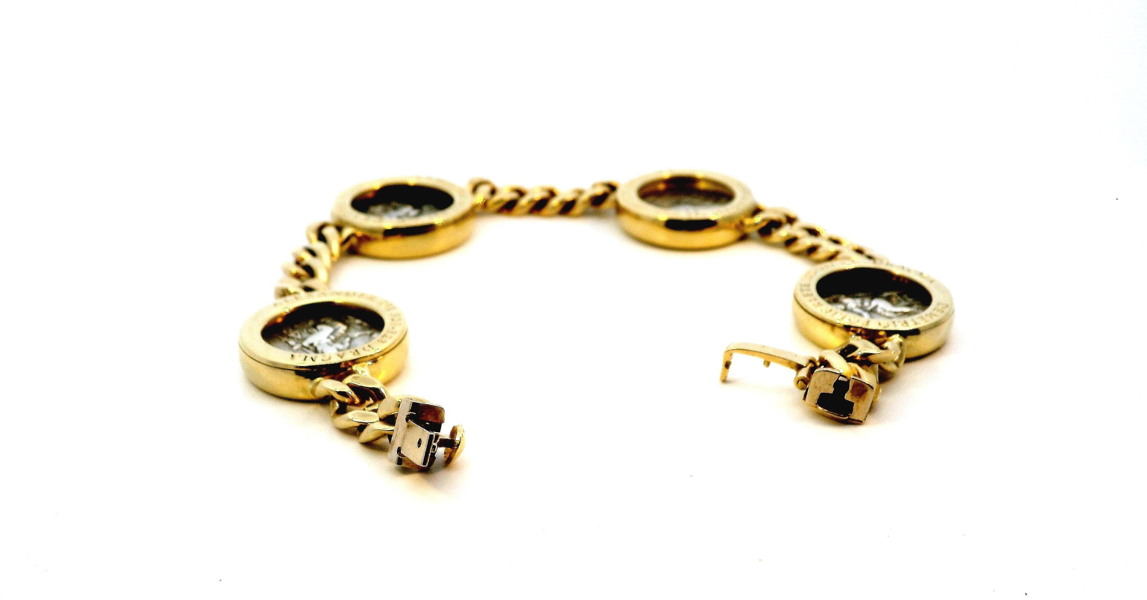 Bvlgari Four Silver Coin Curb Link in 18K Yellow Gold Bracelet In Good Condition For Sale In Great Neck Plaza, NY