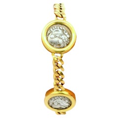Bvlgari Pulsera de eslabones de cuatro monedas de plata en oro amarillo de 18 quilates