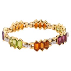 Bracciale Bvlgari con pietre preziose e diamanti in oro giallo e bianco 18 carati