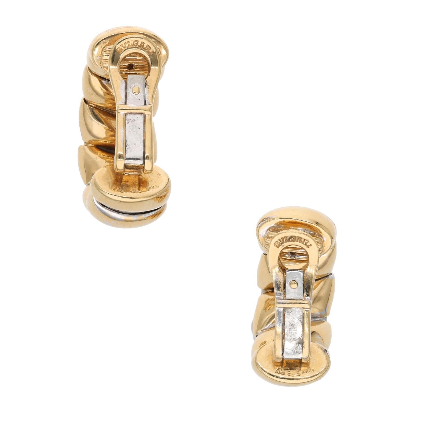 Composed of white gold and gold sections

- 18 karat yellow and white gold
- Signed Bvlgari
- Total weight 29.0 grams
- Length 1 inch

The condition report is Good. 