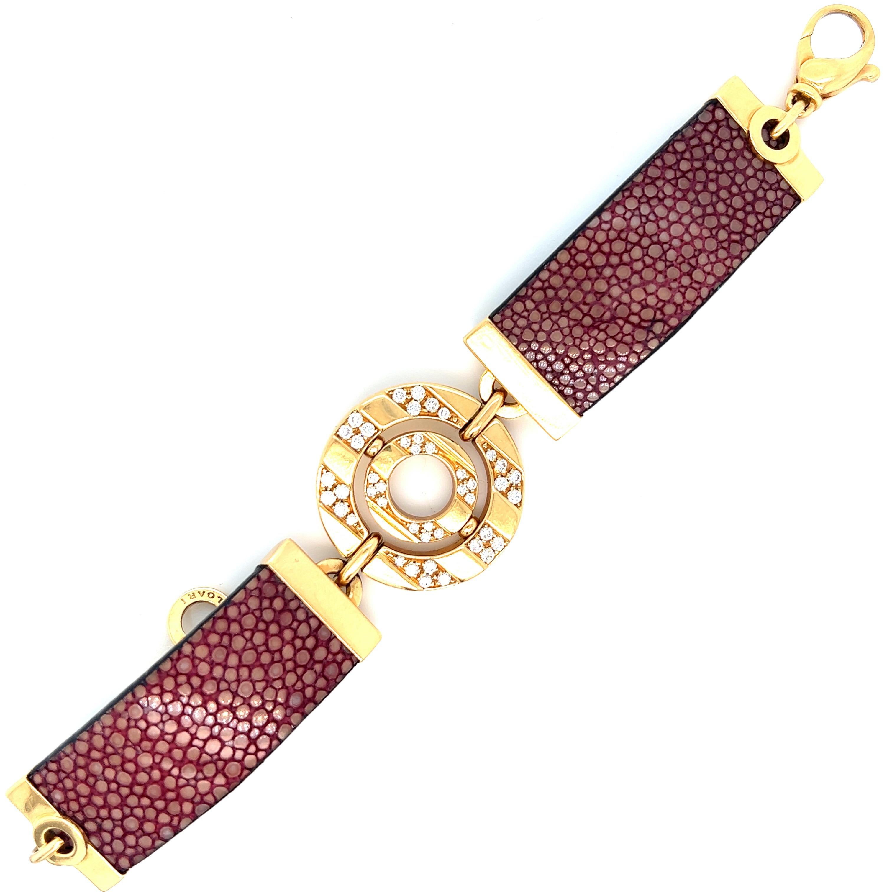 Bvlgari 18 karat yellow gold bracelet with leather straps and diamonds weighing approximately 1 carat. Marked: Bvlgari / 750 / 2331 V1 / Made in Italy. Total weight: 48.1 grams. Width: 1.13 inch. Length: 8 inches. 