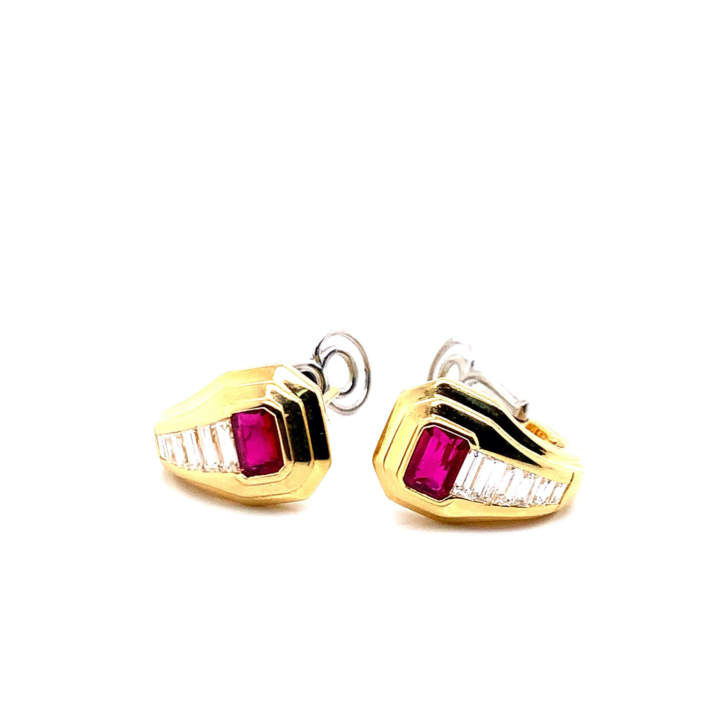 A pair of 18 karat yellow gold earrings with ruby & diamonds, with a total weight of 14.8 grams. The baguette cut white diamonds weigh 1.30 carat, and the emerald cut rubies weigh 1.71 carat. Signed Bvlgari.