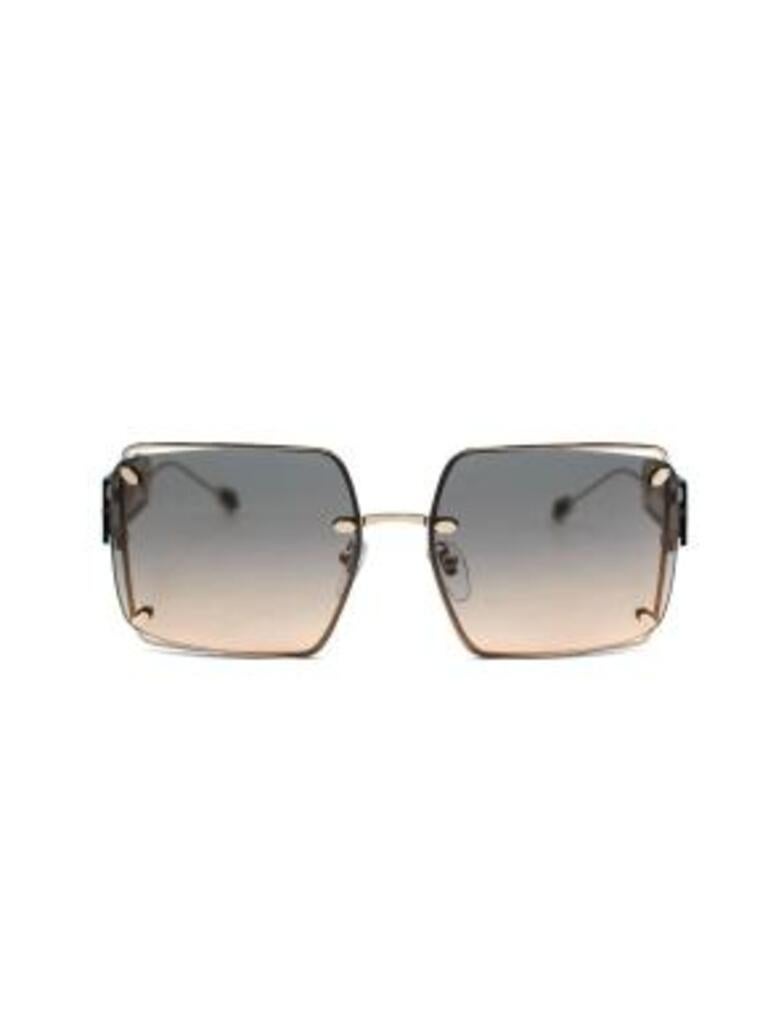 Bvlgari Gold Hardware Square Sunglasses with Brown Lenses & Green Gem Detail
 

 - Lightweight gold-tone metal square frames with brown lenses 
 - Golden arms with acetate logo panel and green gem detail 
 - Adjustable nose rests 
 - Case, box and