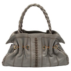 Bvlgari Cartera de piel tejida gris coñac