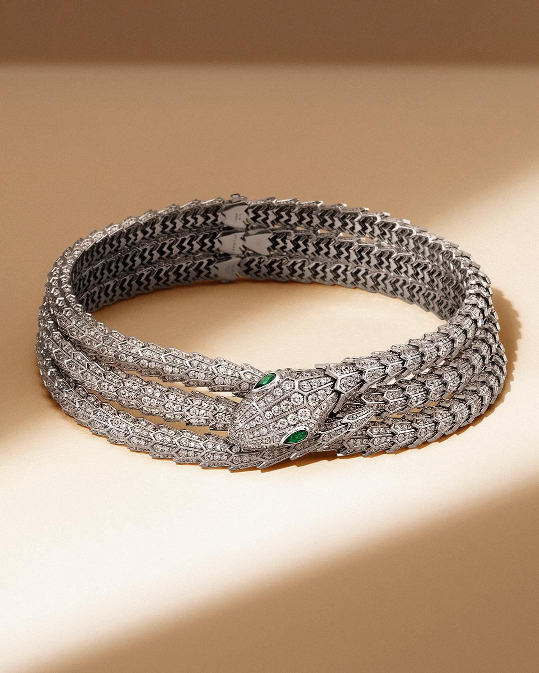 An exquisite piece by BVLGARI, this exclusive style has stunned on the red carpet and is a must have for any collector. The coils of the serpent are set with 60.34 carats of D-F color, Internally Flawless-VVS round diamonds. Its eyes are two pear