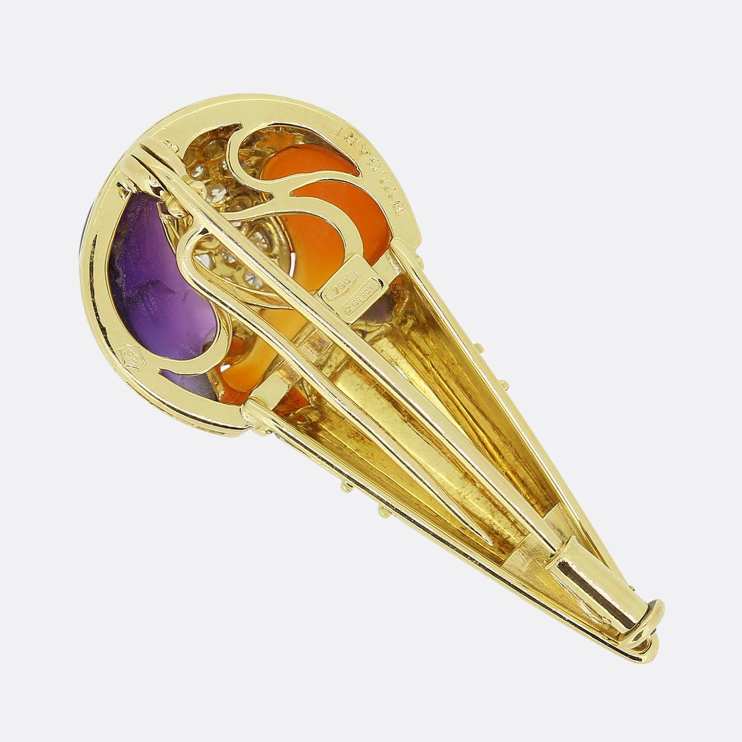 Here we have a delicious insight into the Bvlagri's fun side. This quirky brooch has been crafted from 18ct yellow gold into the shape of an ice cream cone and combines superbly calibrated amethyst and amber with a generous ensemble of pave set