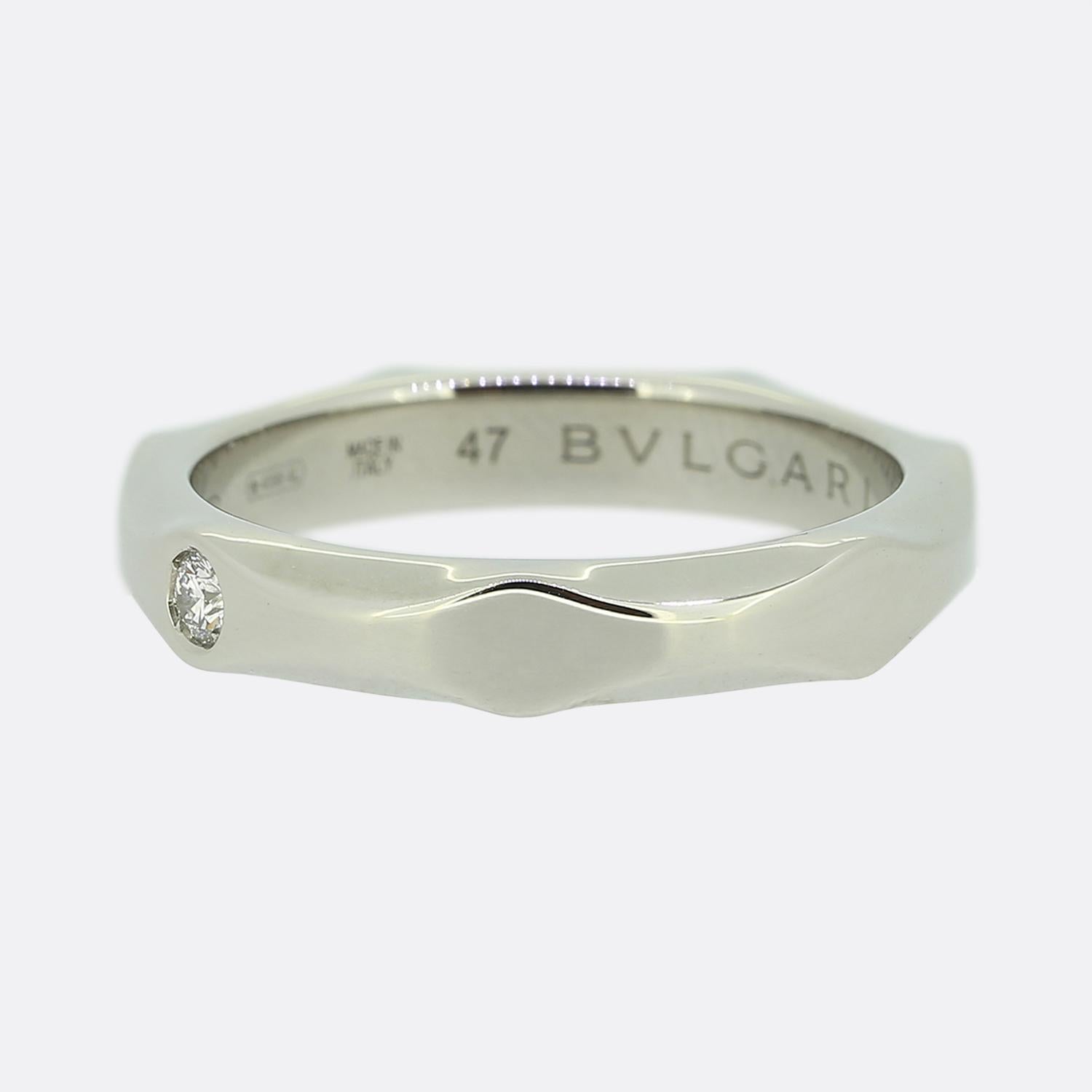Here we have an iconic platinum band ring from the world renowned luxury jewellery house of Bvlgari. Inspired by the eternal movement of eaves. the Infintino wedding bands seal a commitment that knows no boundaries, just like the relentless strength