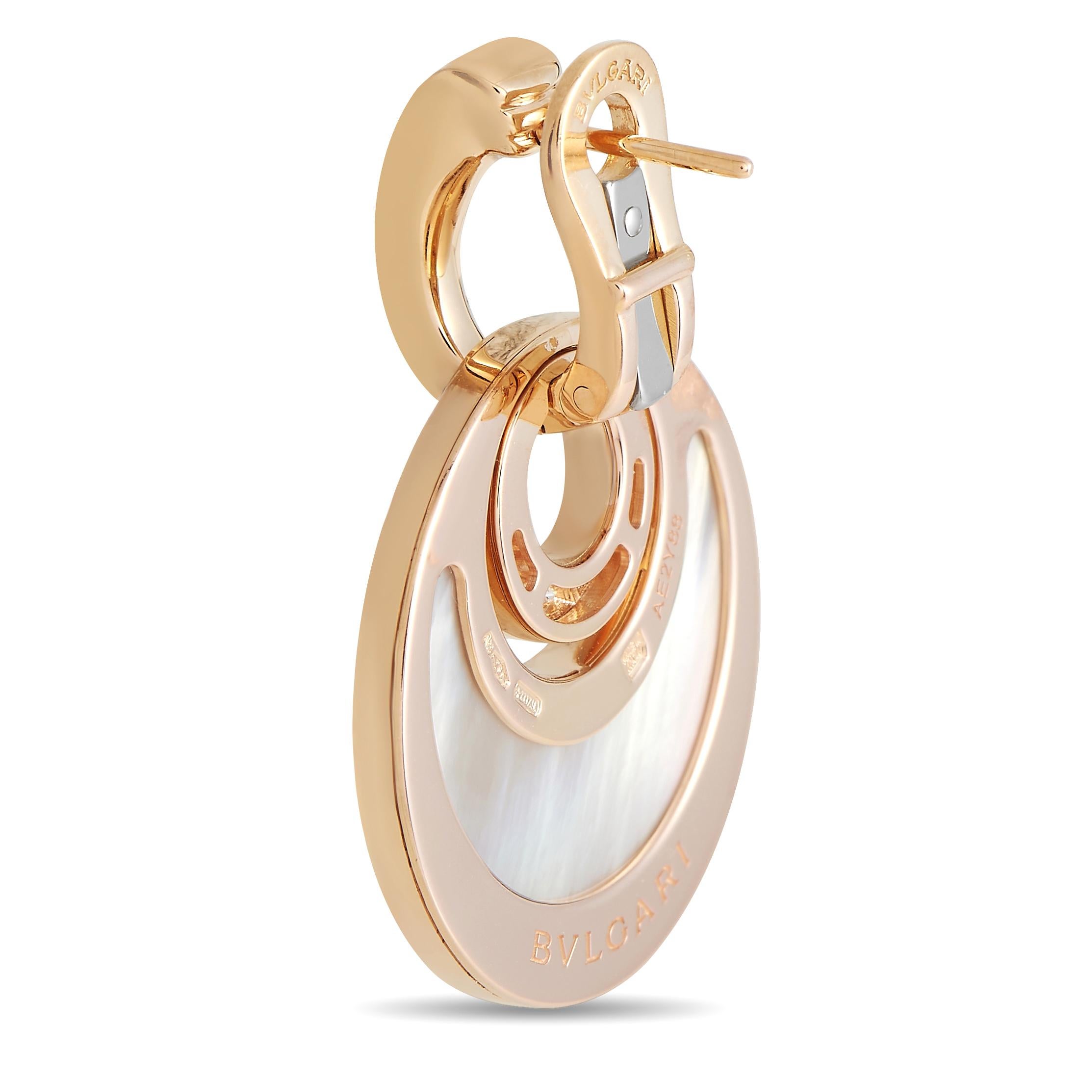 Opulent forms and stylish negative space accents make these Bvlgari Intarsio simply unforgettable. Crafted from lustrous 18K Rose Gold, Diamonds with a total weight of 0.70 carats add a touch of luxury to their contemporary, modern design. Each one