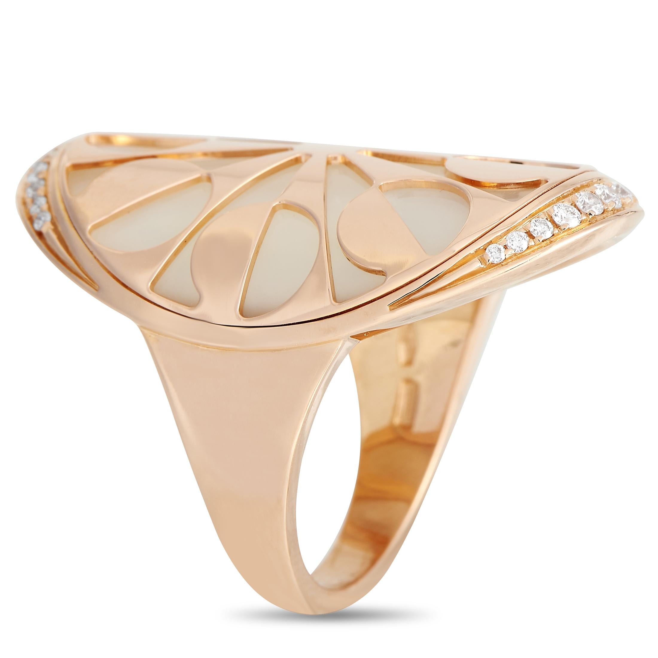 This 18K Rose Gold Bvlgari Intarsio ring is a timeless accessory with a commanding presence. Elevated by opulent Mother of Pearl accents and sparkling Diamonds totaling 0.20 carats, its a breathtaking piece of jewelry that will forever make a