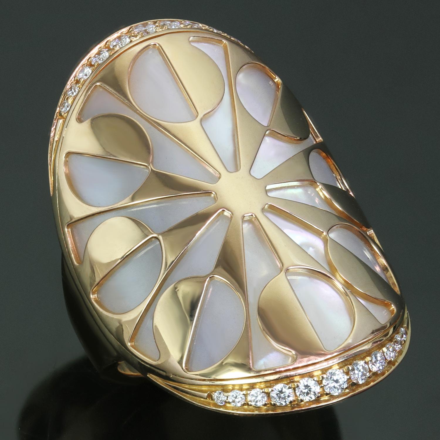 This stunning Bvlgari cocktail ring from the elegant Intarsio collection features a geometric cutout design hand-crafted in 18k rose gold and mother-of-pearl and accented with brilliant-cut round E-F VVS1-VVS2 diamonds weighing an estimated 0.21