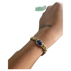 BVLGARI ITALY Gliederarmband aus 18 Karat Gelbgold mit Diamanten und Cabochon-Saphiren