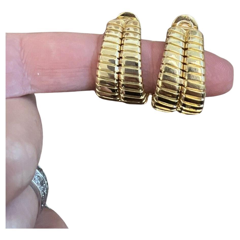 Bvlgari Italy 18k Yellow Gold Double Tubogas Hoop Earrings Vintage Circa 1980s

Here is your chance to purchase a beautiful and highly collectible designer pair of earrings.  

The length is 1 1/8 inches.  The weight is 38.4 grams.  the earrings are