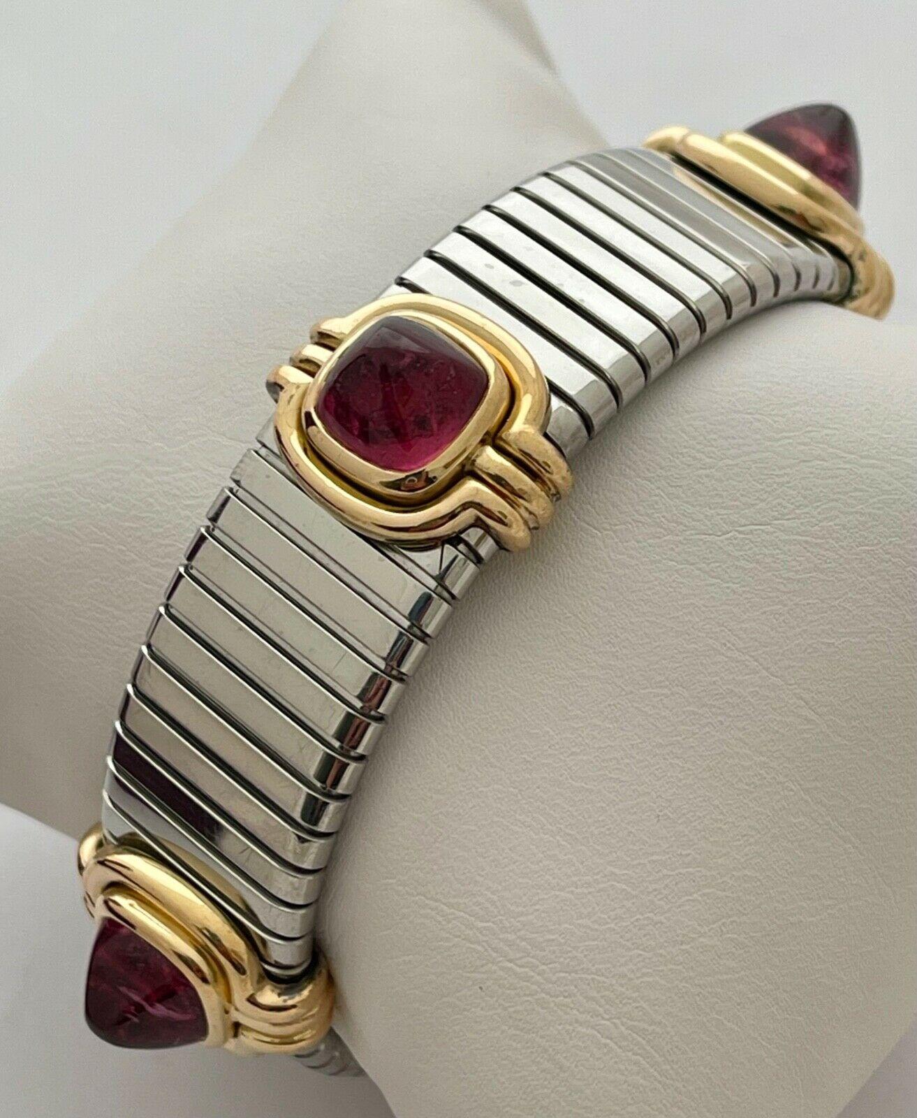 Bvlgari Italy 18k Yellow Gold, Stainless Steel & Pink Tourmaline Tubogas Bangle Bracelet Vintage

Here is your chance to purchase a beautiful and highly collectible designer bracelet.  Truly a great piece at a great price! 

The length will fit any
