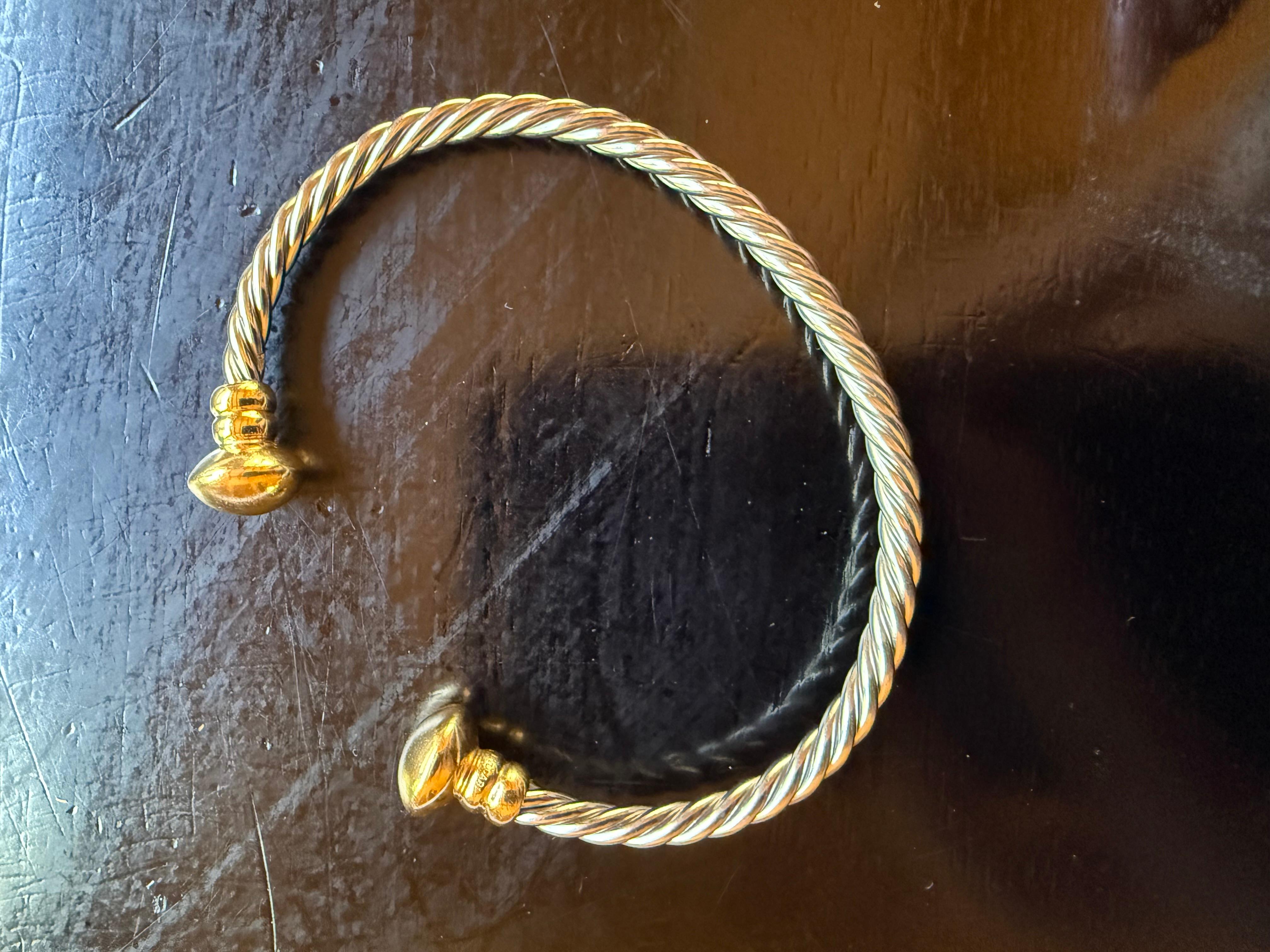 Bvlgari Italy 18k Yellow Gold & Stainless Steel Rope Bangle Bracelet 1980s Vintage



Here is your chance to purchase a beautiful and highly collectible designer bangle bracelet.  


Description: Offering a vintage Bvlgari Italy bangle bracelet. 
