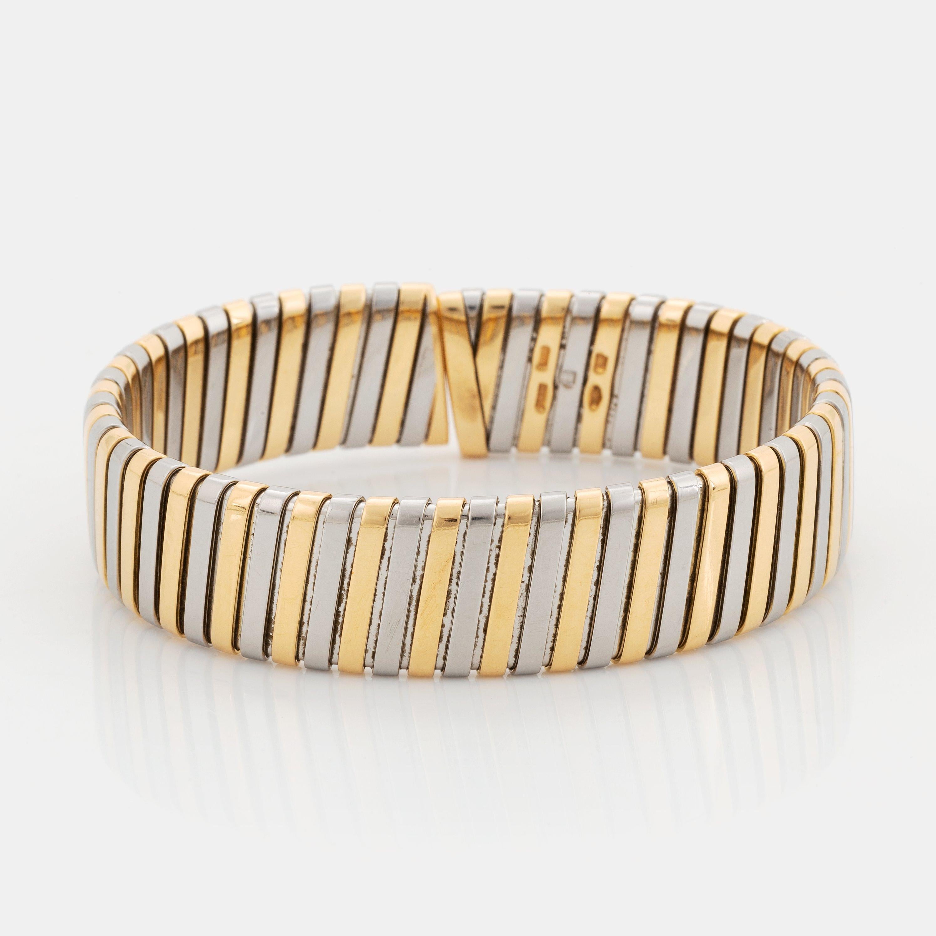 Bvlgari Italy 18k Yellow Gold & Stainless Steel Tubogas Bracelet Vintage

Here is your chance to purchase a beautiful and highly collectible designer bracelet.  Truly a great piece at a great price! 

The weight is 41.6 grams.  The width is over 1/2