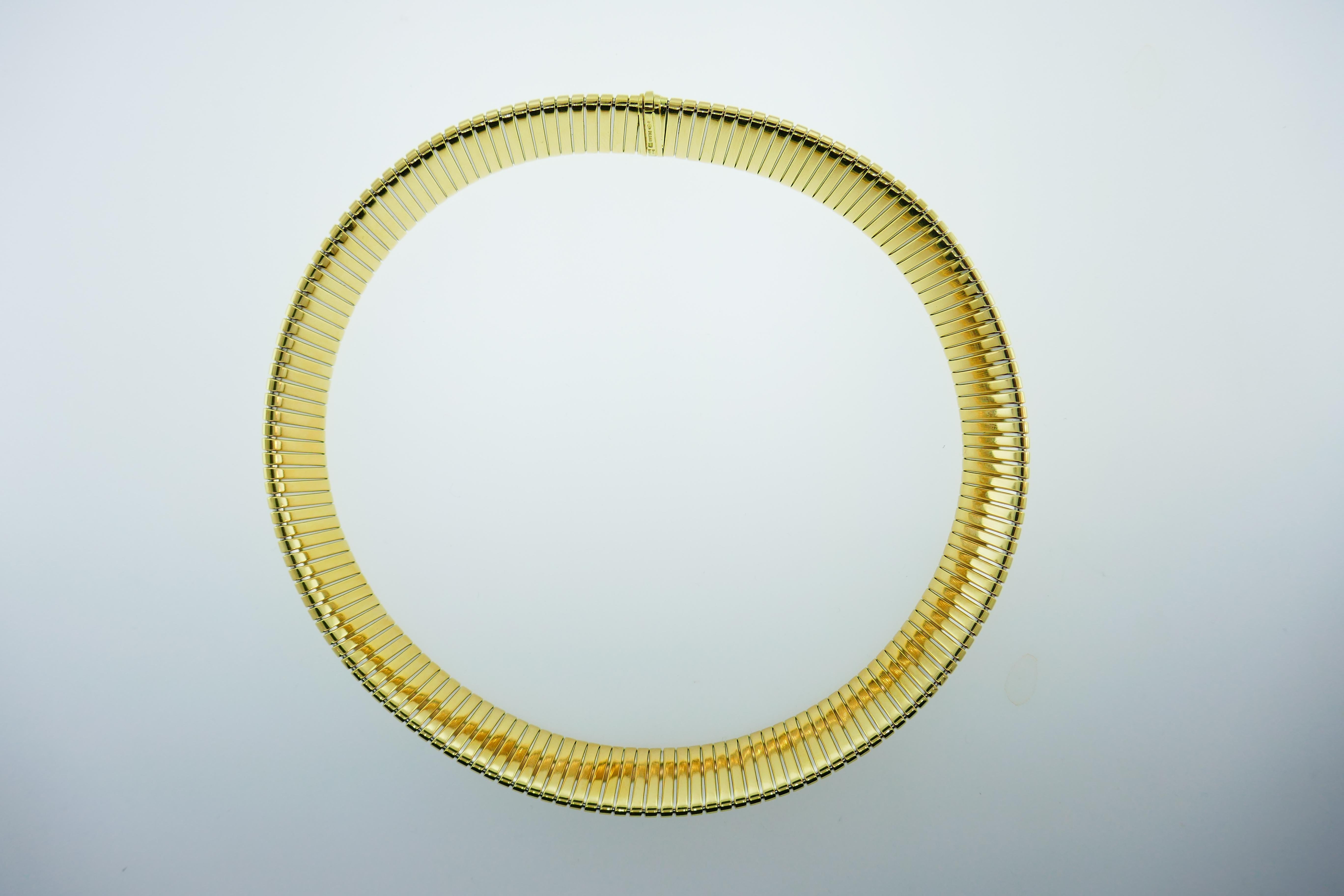 Bvlgari Italy 18k Yellow Gold Tubogas Collection Choker Necklace Circa 1980s

Here is your chance to purchase a beautiful and highly collectible designer choker necklace.  Truly a great piece at a great price! 

Weight: 106.4 grams

Dimensions: 15