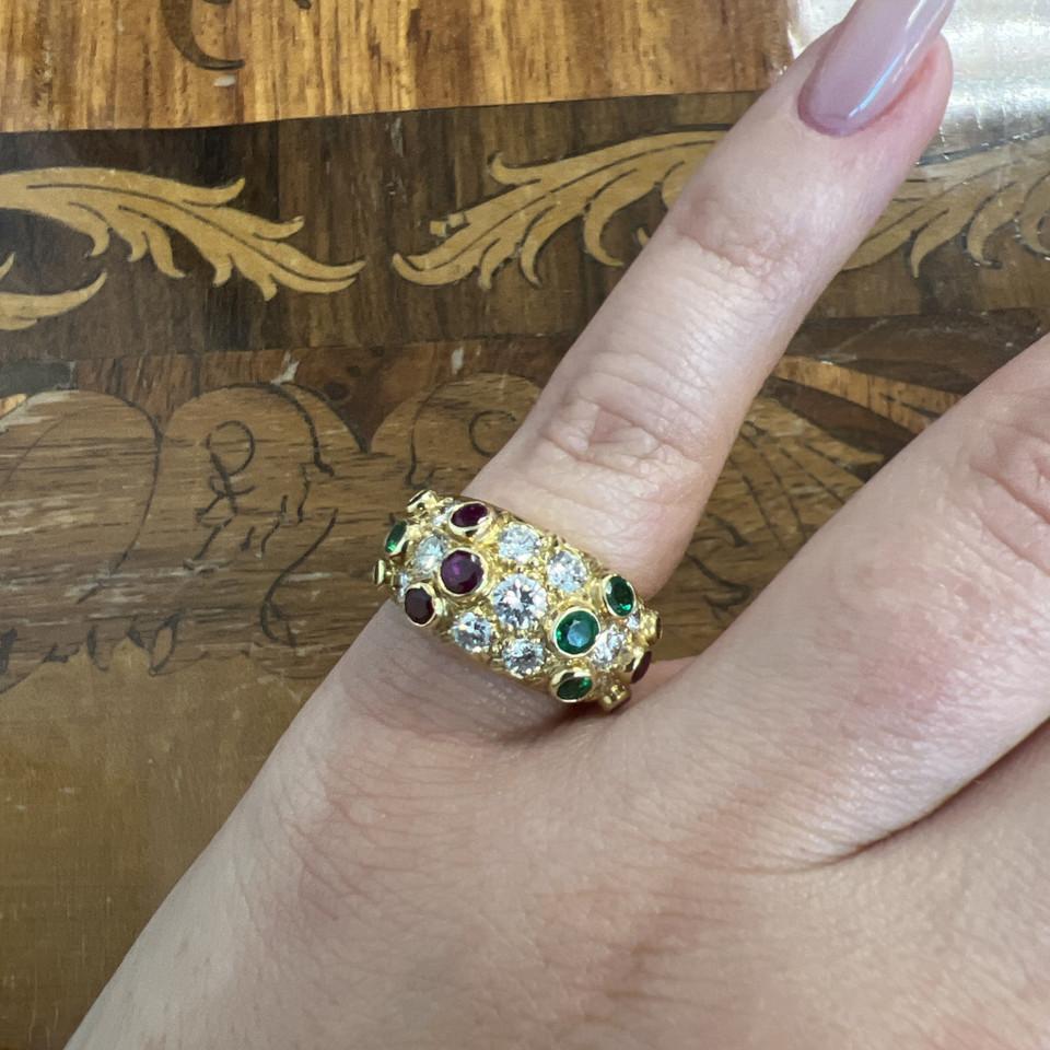 Bvlgari Italy 20k Yellow Gold, Diamond, Ruby & Emerald Cocktail Ring 1970s Vintage

Here is your chance to purchase a beautiful and highly collectible vintage designer ring.  

Highly collectible and well-made vintage Bvlgari Italy 20k yellow gold,