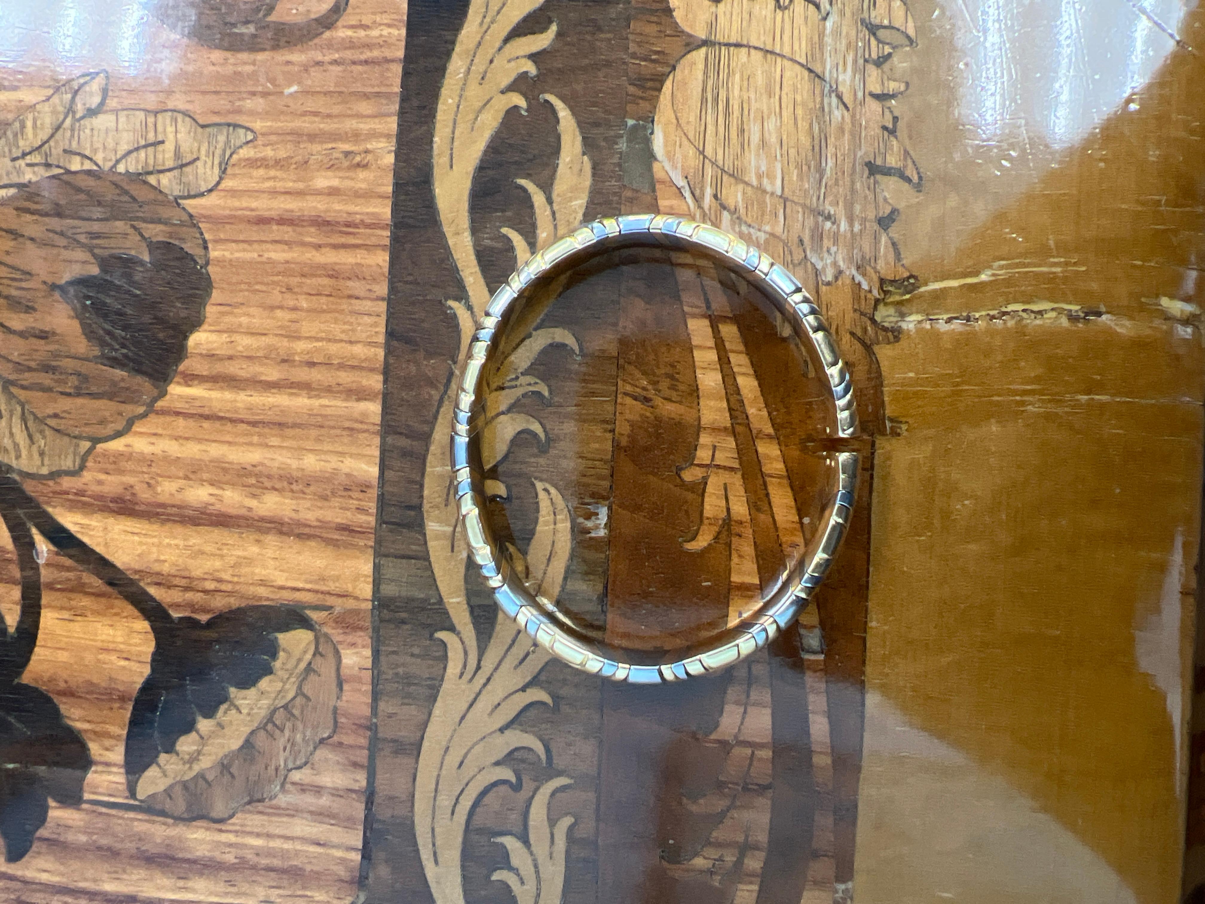 Bvlgari Italy 18k Yellow Gold & Stainless Steel Alveare Collection Bangle Bracelet Circa 1980s Vintage

Here is your chance to purchase a beautiful and highly collectible designer bracelet.  Truly a great piece at a great price! 

Details:

Bvlgari