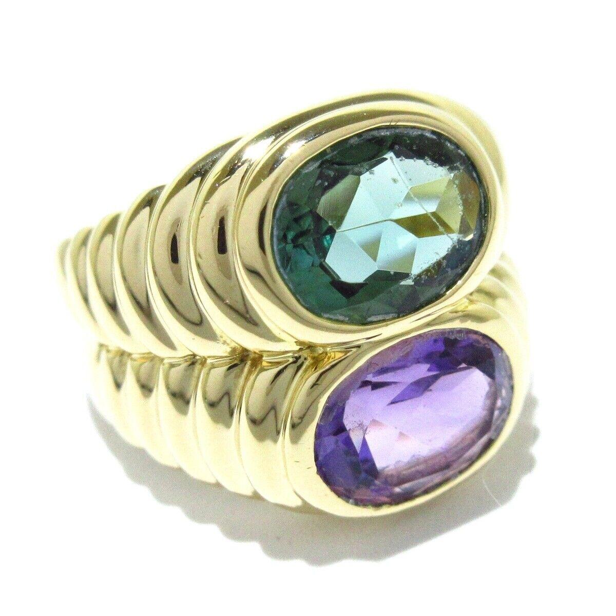Bvlgari Italy Doppio 18k Yellow Gold, Amethyst & Green Tourmaline Ring Vintage

Here is your chance to purchase a beautiful and highly collectible designer ring.  Truly a great piece at a great price! 

The ring size is between 5.75 and 6.  
The
