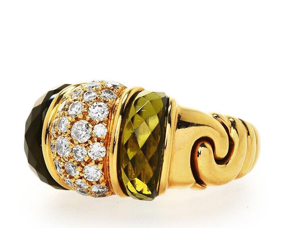 BVLGARI ITALY Ganci Collection 18k Yellow Gold, Peridot & Diamond Cocktail Ring

Here is your chance to purchase a beautiful and highly collectible designer ring.  Truly a great piece at a great price! 

Bvlgari, Ganci Diamond & Peridot 18K Gold