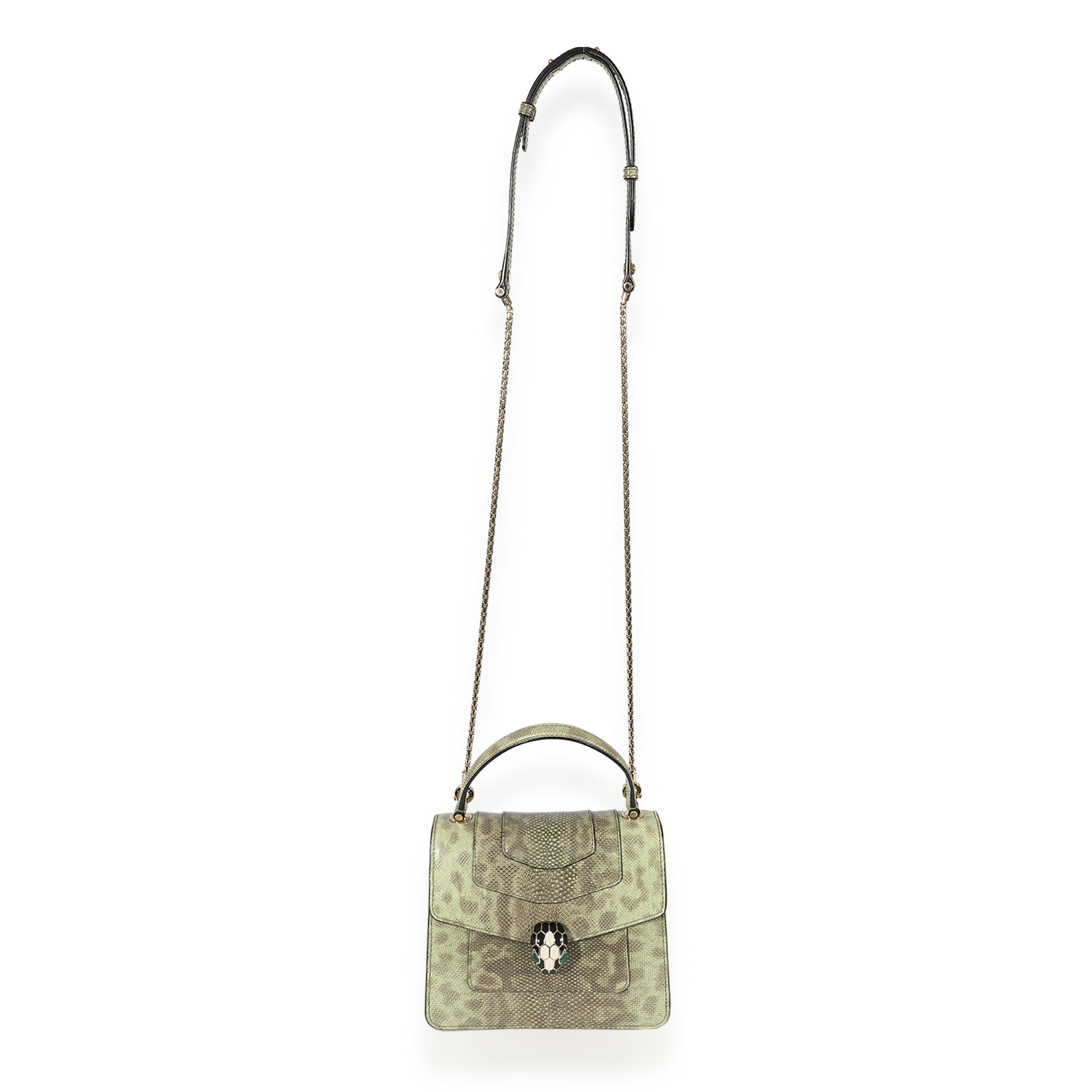 Listing Title: BVLGARI Karung Serpenti Forever Top Handle
SKU: 125199
MSRP: 4450.00
Condition: Pre-owned 
Handbag Condition: Very Good
Condition Comments: Very Good Condition. Exterior corner scuffing and throughout. Scratching at hardware. Interior