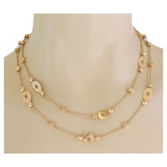 Collana lunga Bvlgari Lucia Collection in oro giallo 18k con motivi a cubo marquise