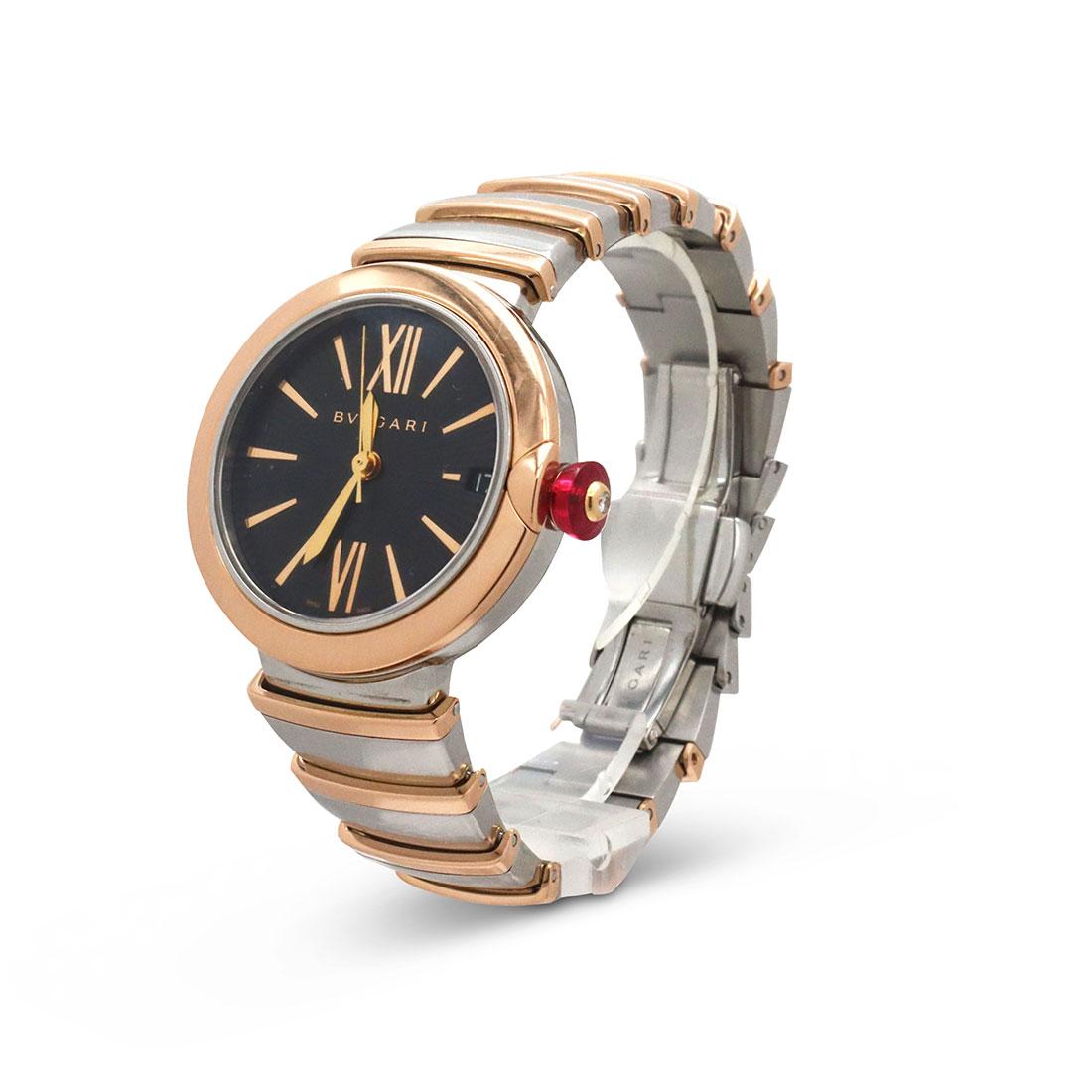 Authentic Bvlgari LVCEA  Ladies watch crafted in 18 karat rose gold and stainless steel.   Featuring a 33 mm case with black sundial guilloche pattern dial, Roman Numeral hour markers, and a transparent case back.  The 18 karat rose gold crown is