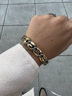 Bracciale BVLGARI Made in France in oro giallo 18 carati e acciaio inox, circa anni '80
