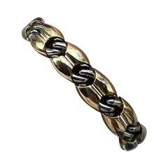 Bracciale BVLGARI Made in France in oro giallo 18 carati e acciaio inox, circa anni '80
